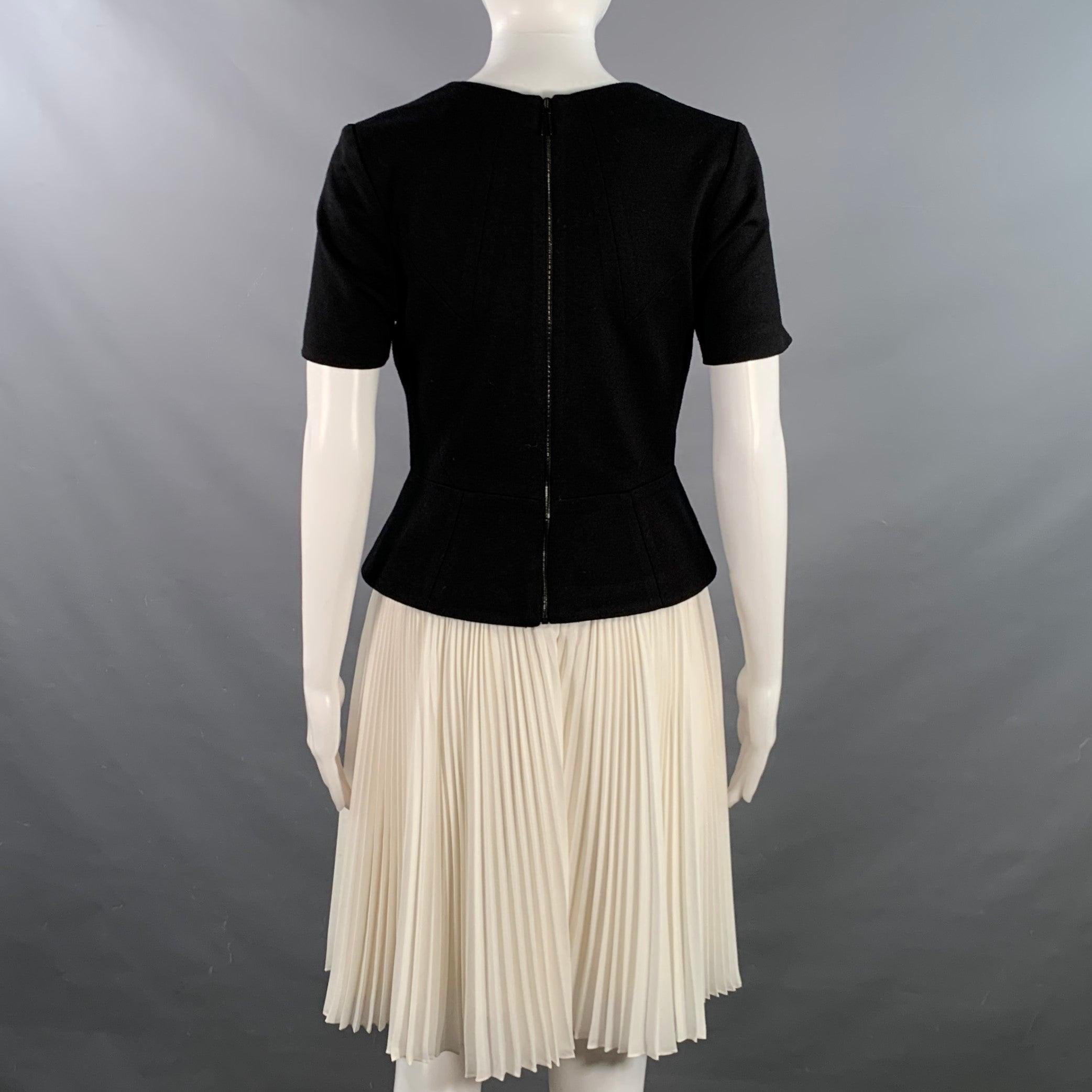 JASON WU Size 6 Black White Color Block Short Sleeve Peplum Pleated Cocktail Dress In Good Condition For Sale In San Francisco, CA