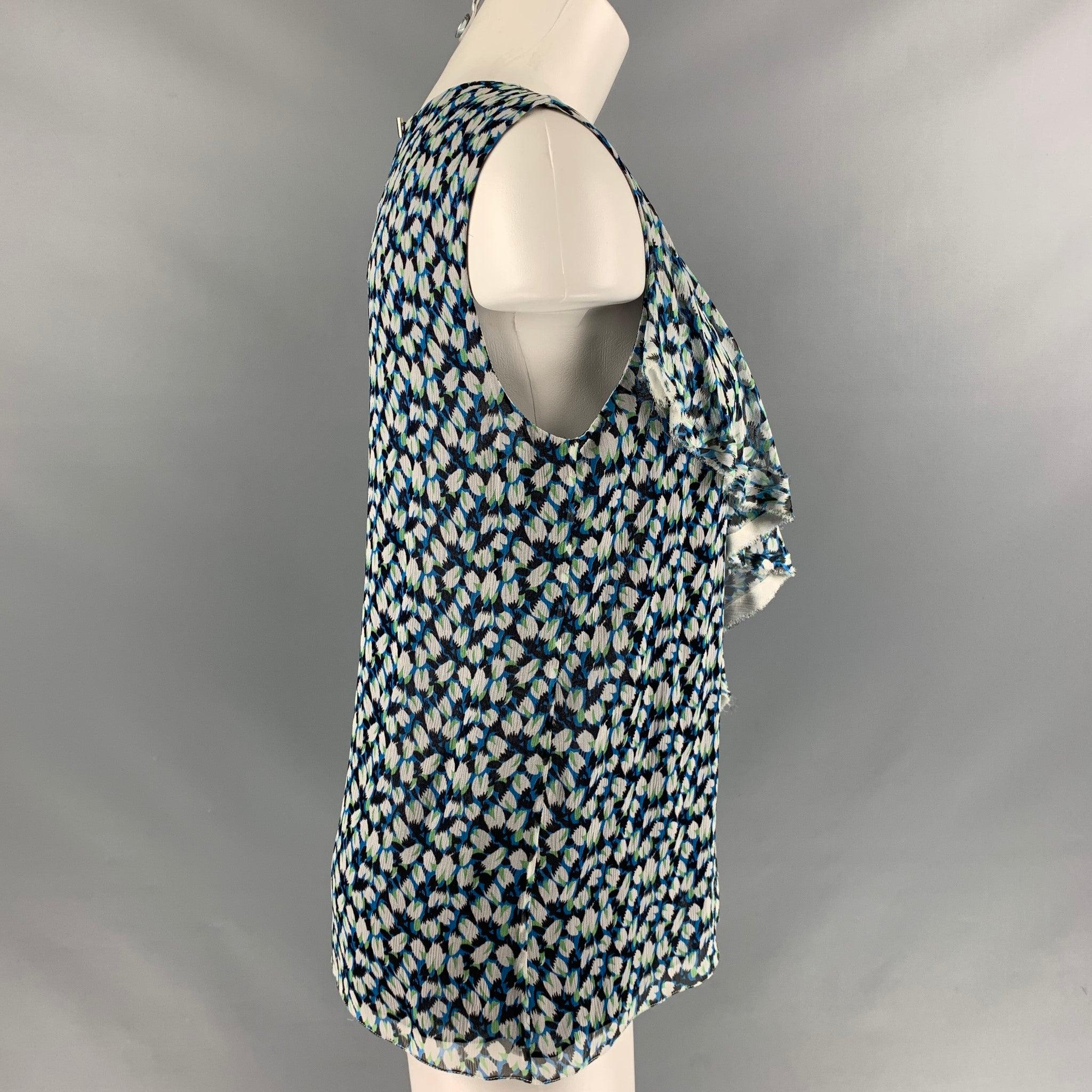 JASON WU sleeveless blouse comes in black, blue and white floral print silk chiffon fabric featuring an asymmetrical hem. Made in USA.Excellent Pre-Owned Condition. 

Marked:   6 

Measurements: 
 
Shoulder: 14 inches Bust: 39 inches Length: 25.5