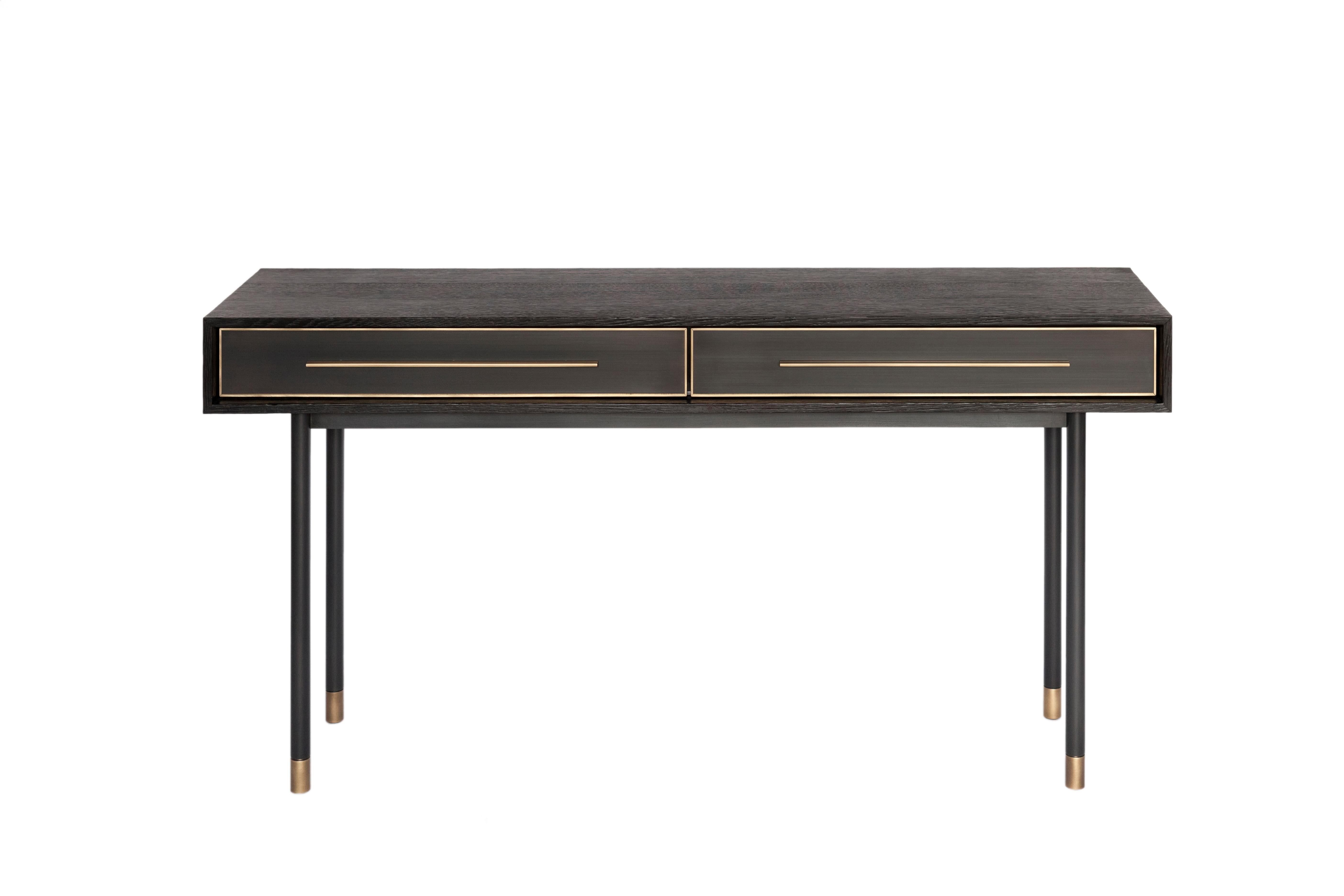 The sleek and striking Jasper console features charred black oak, a blackened steel frame and bronze base with adjustable feet, and blackened bronze encased in epoxy resin drawers with black leather lining and hand-sculpted bronze pulls.

Dimensions