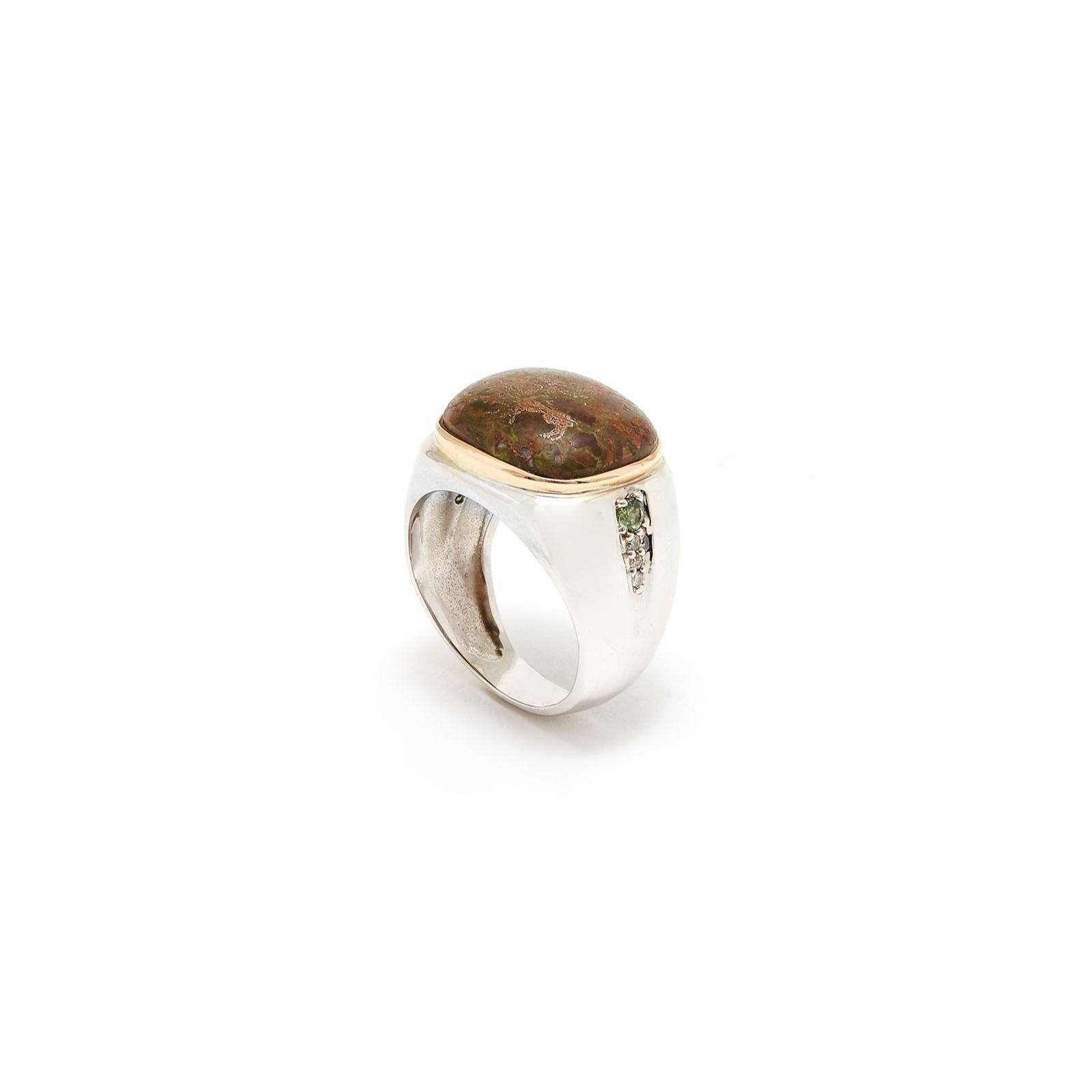 A beautiful moss green and earth brown jasper set in white gold accented with emeralds and diamonds.

  - Size 7.5 ring is resizable
  - Length 22 cm.
  - Width 18 cm.