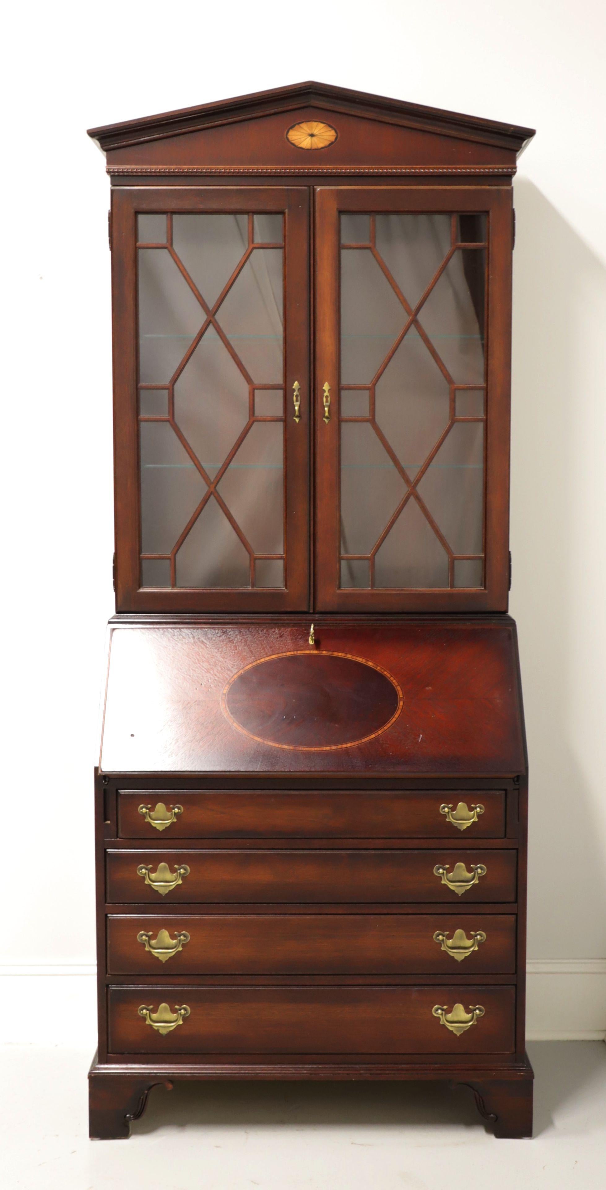 A Chippendale style secretary desk by Jasper Cabinet Company, their 