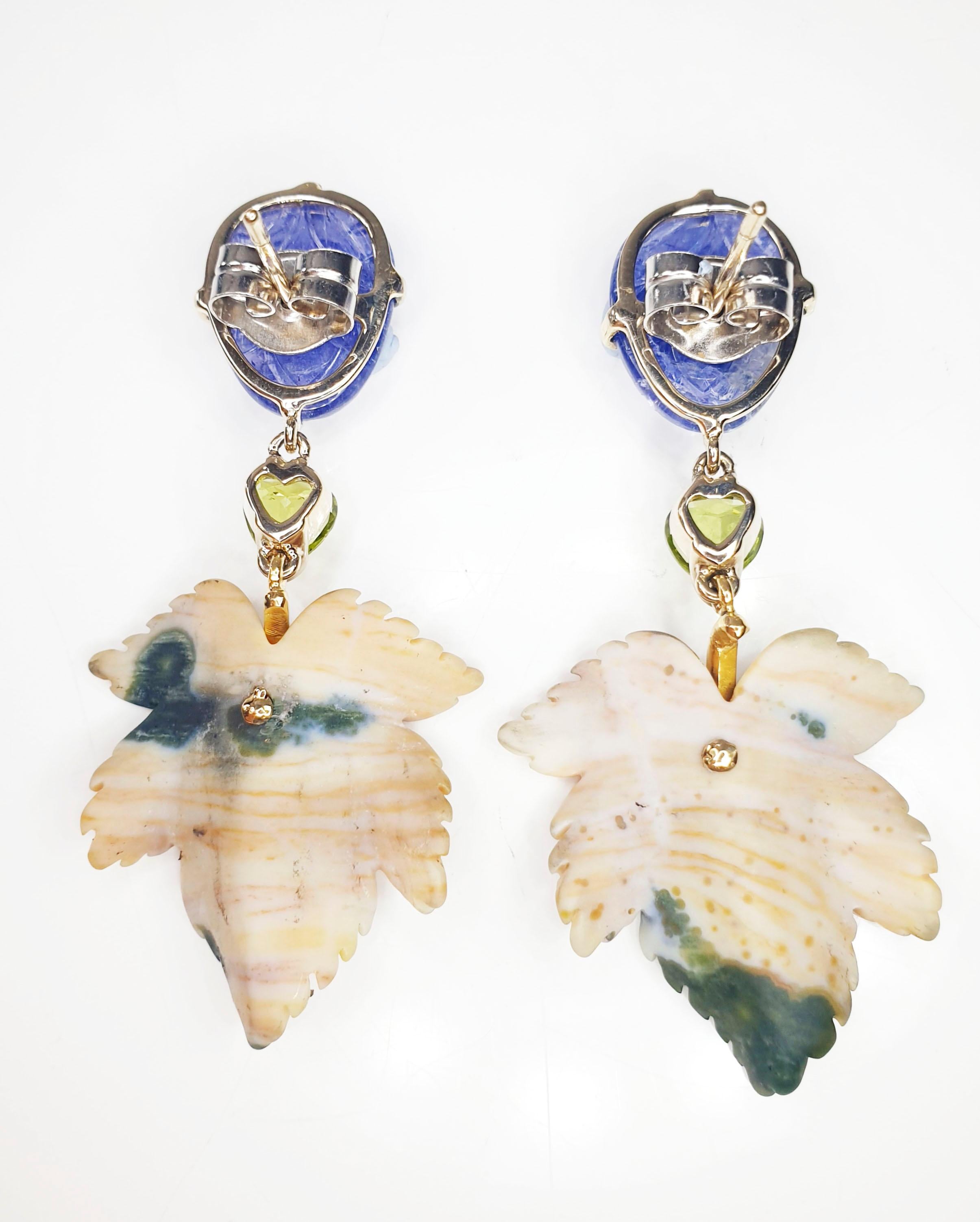 Jasper Leafs  carved tanzanites  peridote in yellow and white 18k gold drop earrings
Irama Pradera is a Young designer from Spain that searches always for the best gems and combines classic with contemporary mounting and styles. 

◘ Length 5cm /