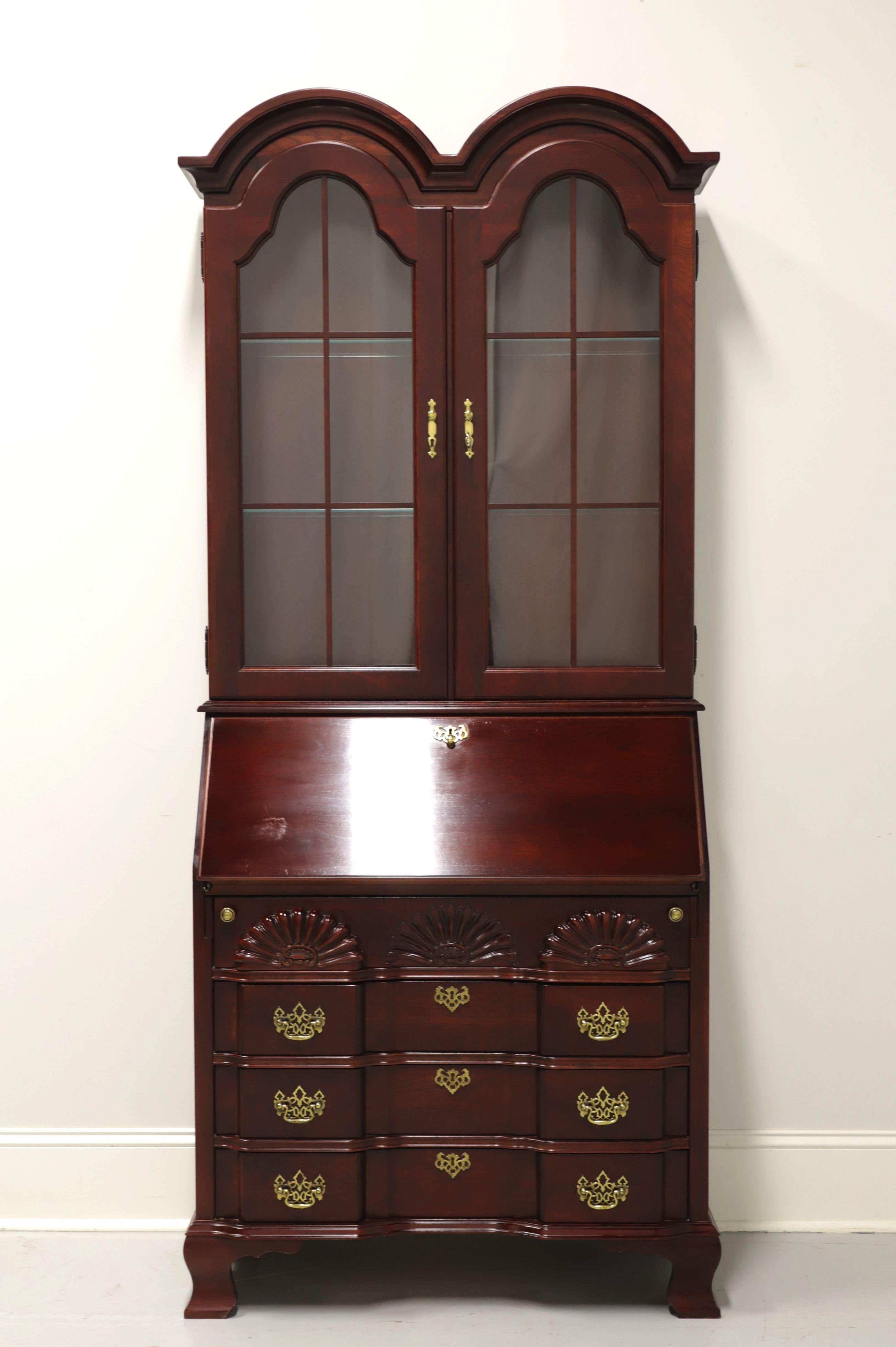 A Chippendale style secretary desk by Jasper Cabinet Company, their 