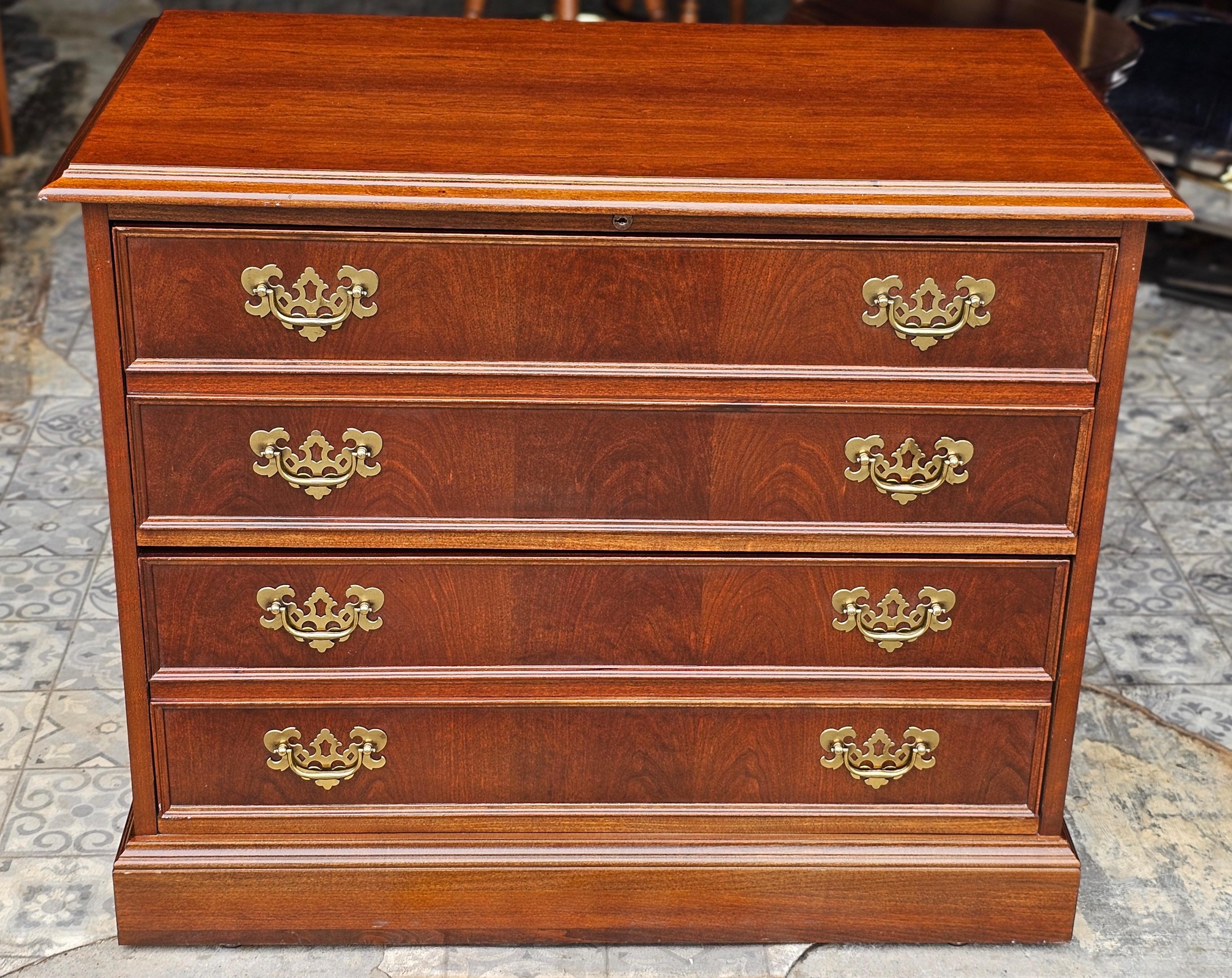A Jasper Cabinet Company Mahogany Chippendale Executive Lateral Filing Cabinet in great vintage condition.
Measures 36