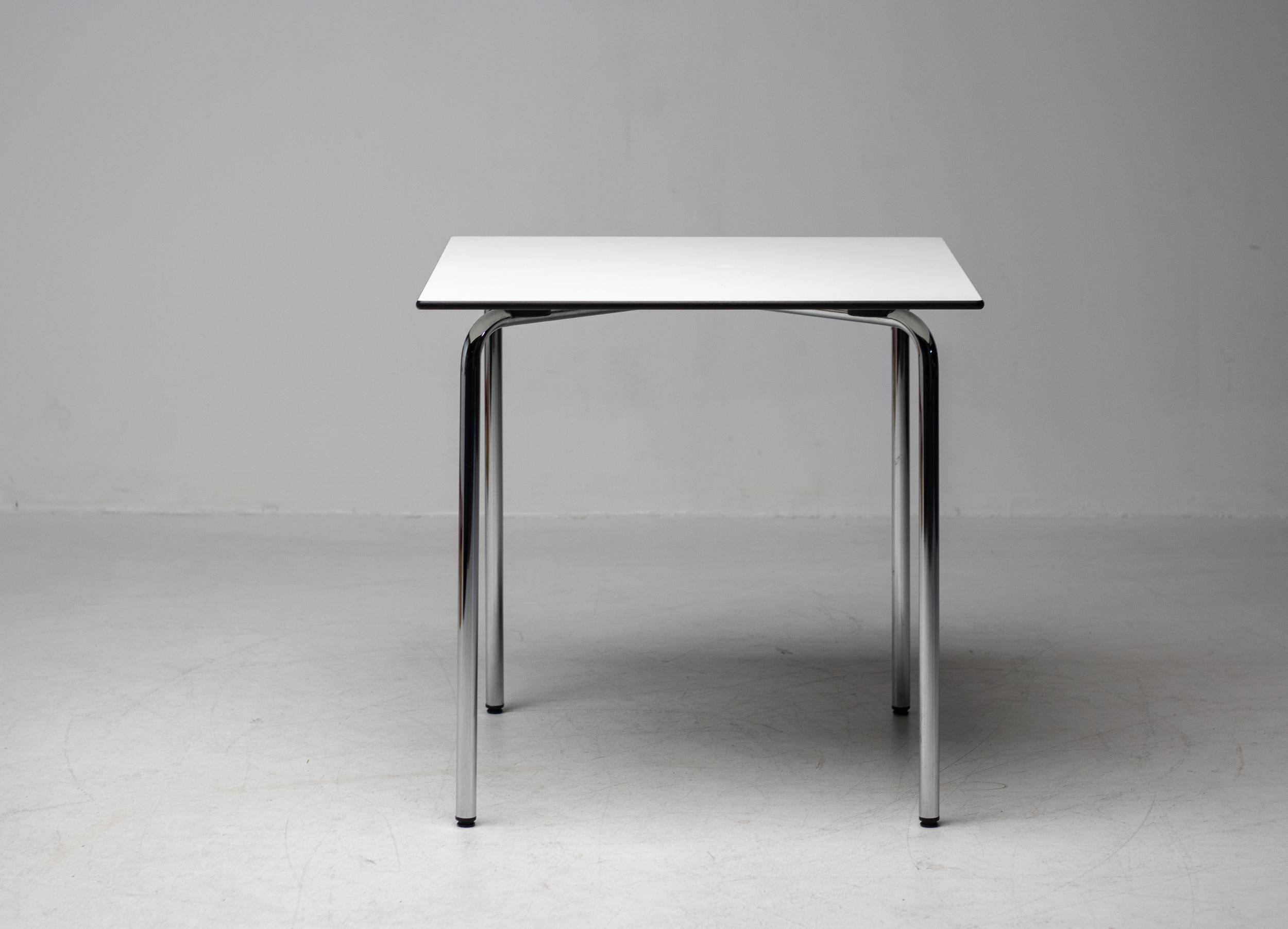 The HAL Table was designed by Jasper Morrison as a companion table for the HAL Chair.
The square table top is exceptionally robust. With a chrome-plated base, the table makes a perfect match for HAL Chair models. Materials; Table top: solid core