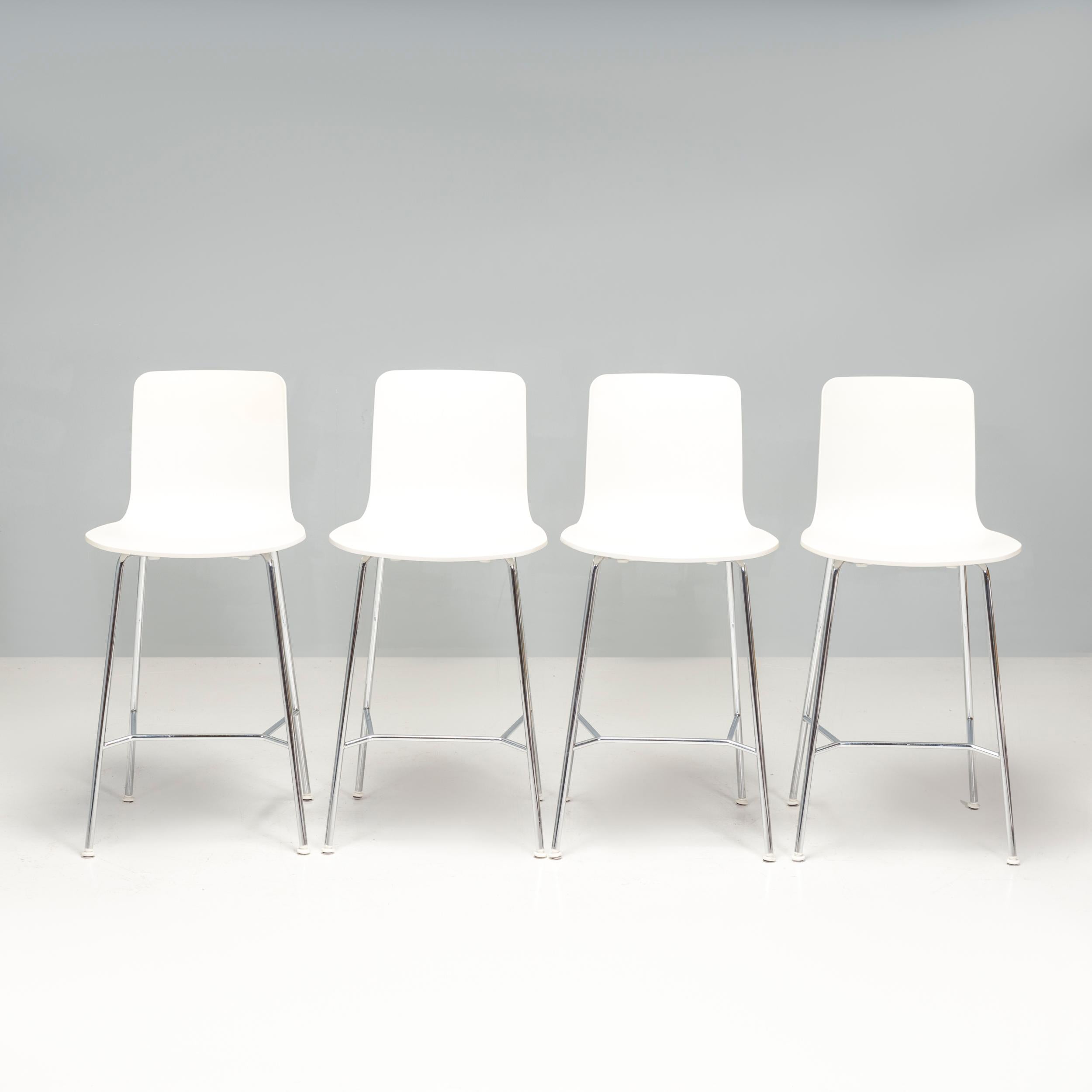 HAL is Jasper Morrison's interpretation of a shell chair in the tradition of the Plastic Chair by Charles and Ray Eames, whose variety of different bases enables versatile use. 

These barstools with a white seat shell in recycled plastic have clean