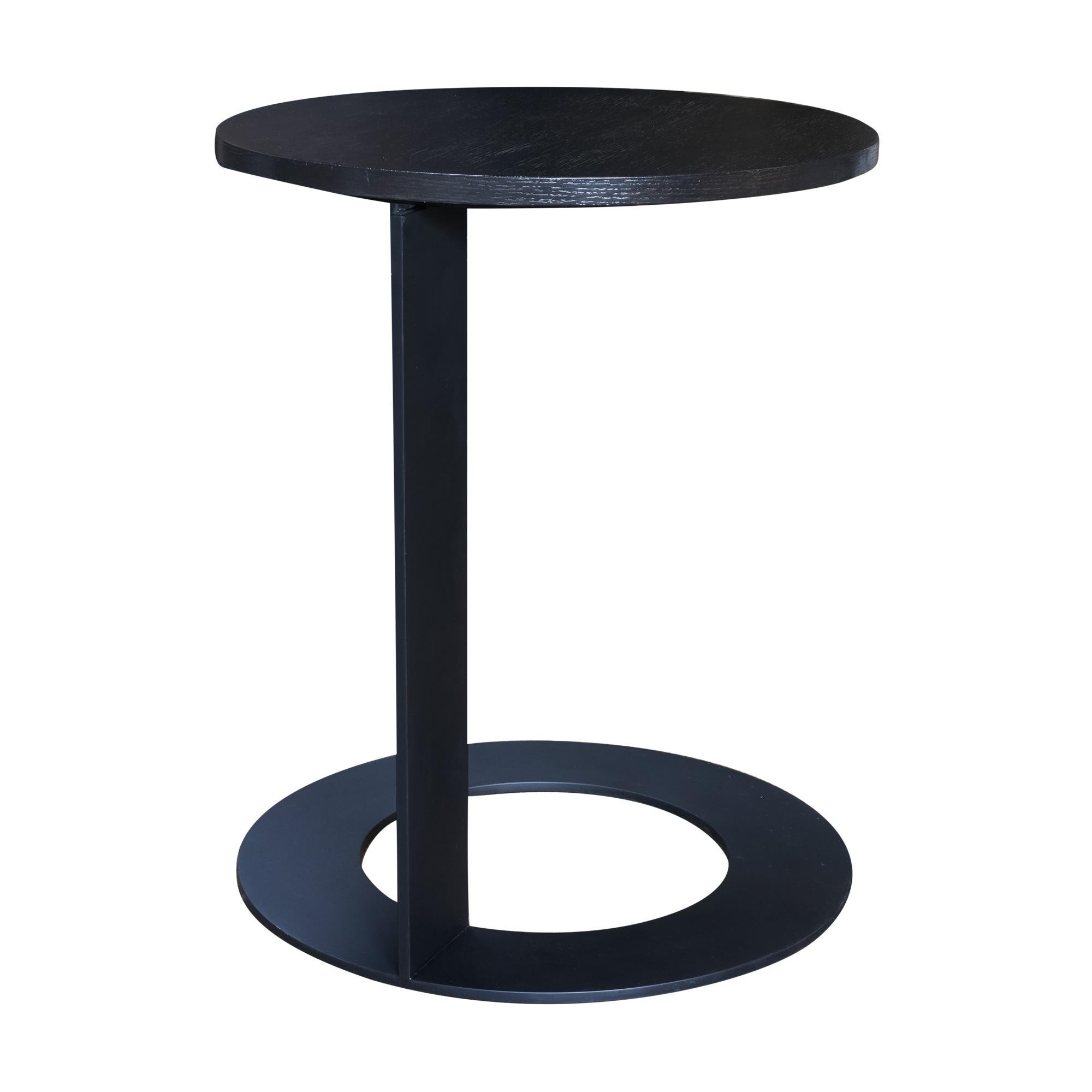 Side table with black steel structure and stained oak top.
Can be customized to specification.