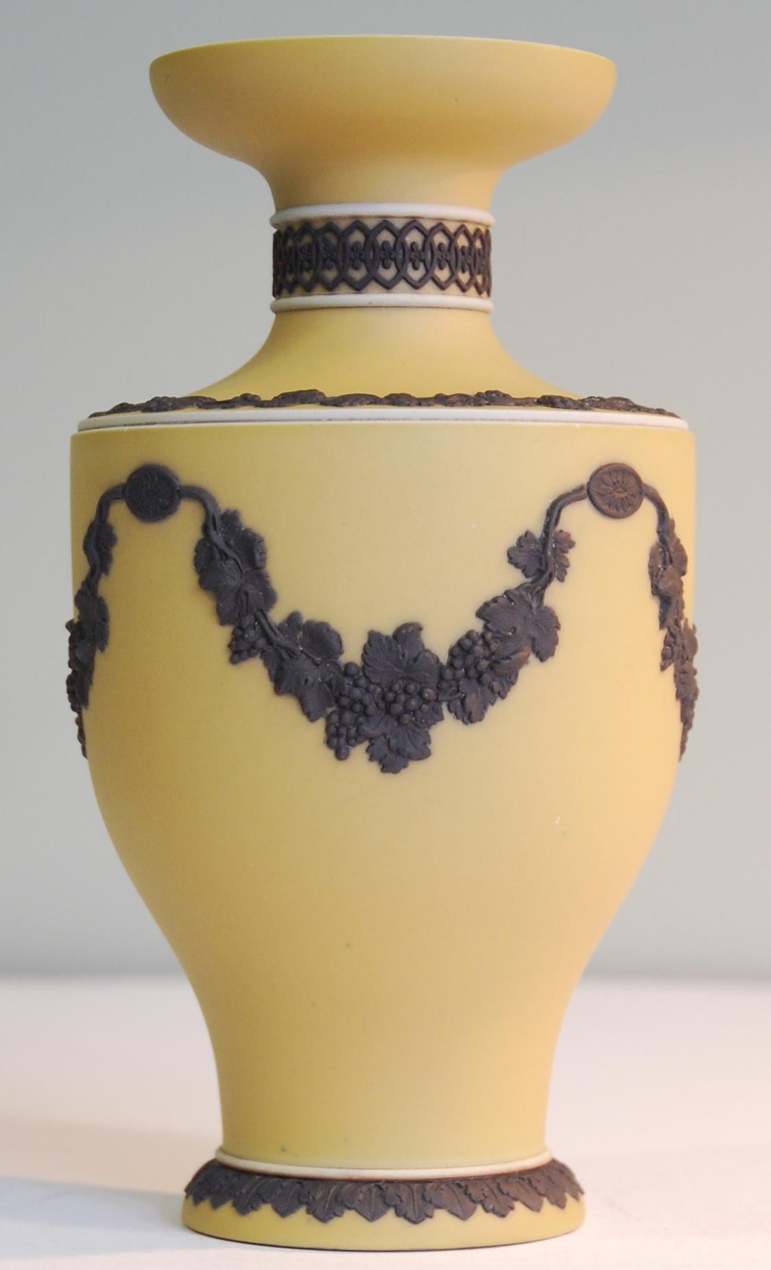 A rare shape, in the scarce buff jasper dip with black ornament. A striking and unusual combination of colours in jasperware.