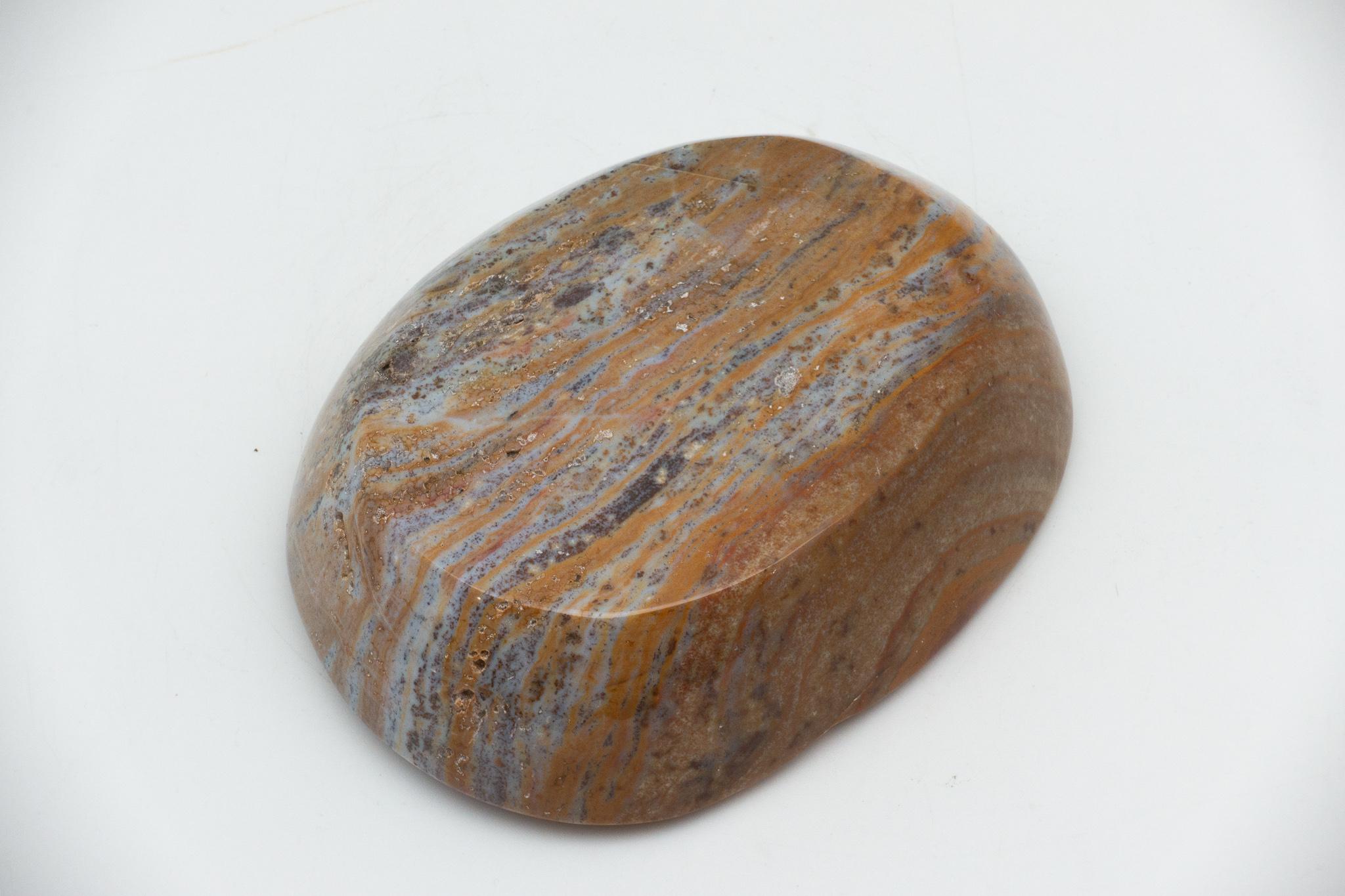 Hand carved jasper vide-poche or coin tray from Madagascar. The vide-poche (empty-pocket in French) is a small bowl or container kept in a convenient location to empty your pockets into when you walk through the door.
