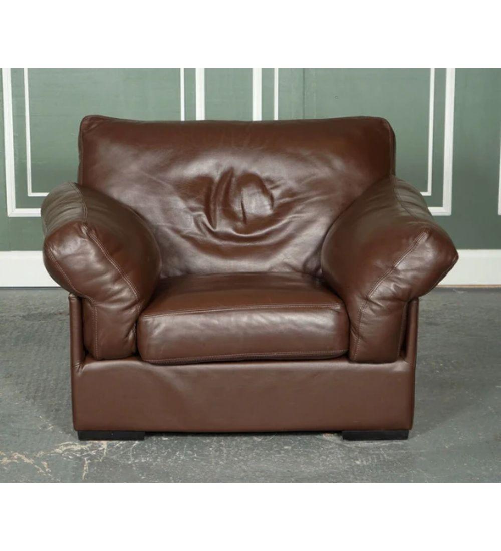 We are delighted to offer for sale this stunning John Lewis Java brown leather armchair.

The armchair is very comfortable and the leather feels buttery soft.

All cushions have zips attached to the sofa base, so they won't slide away from your