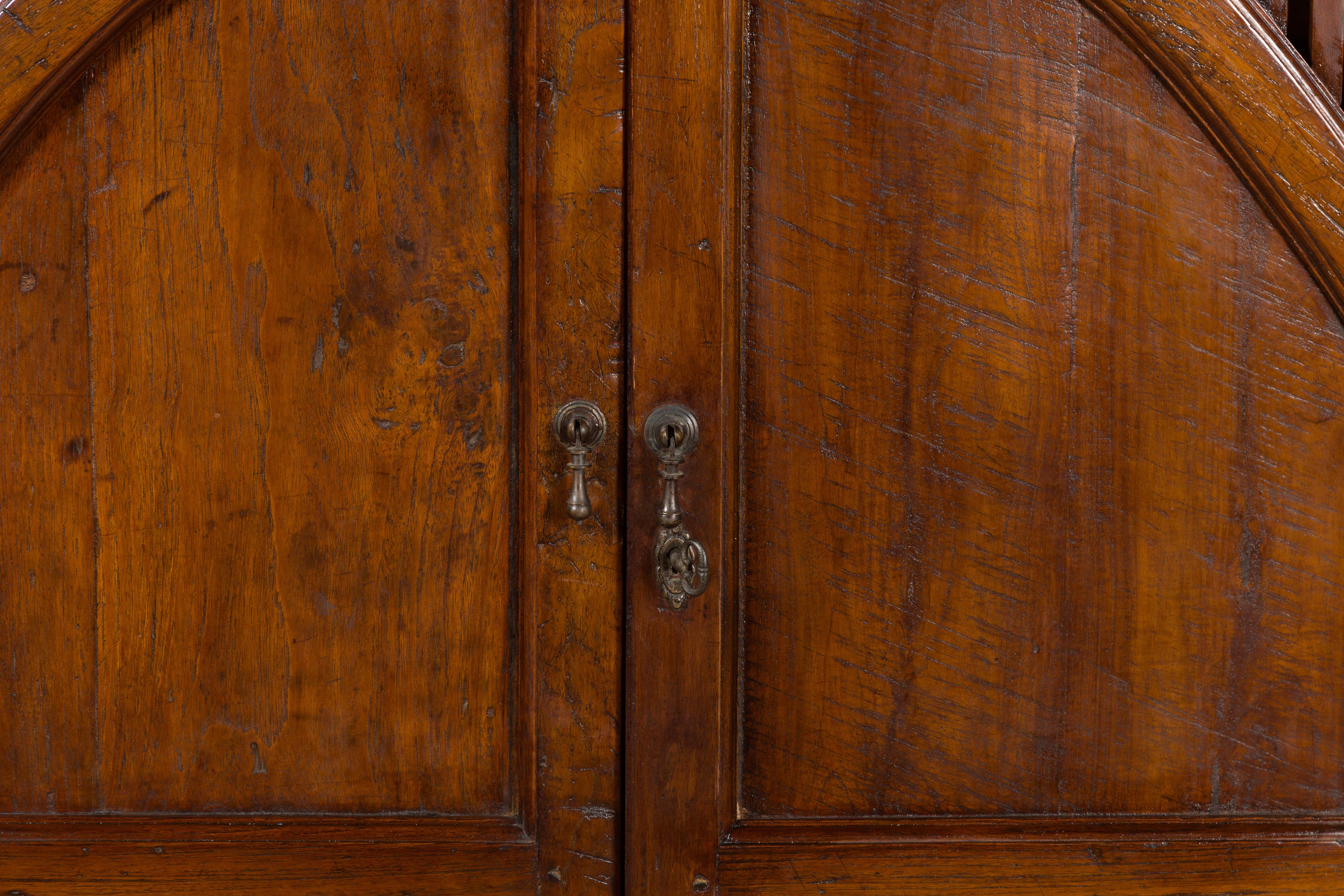 Javanese Antique Teak Armoire with Slatted Motifs, Tapered Feet and Patina For Sale 1