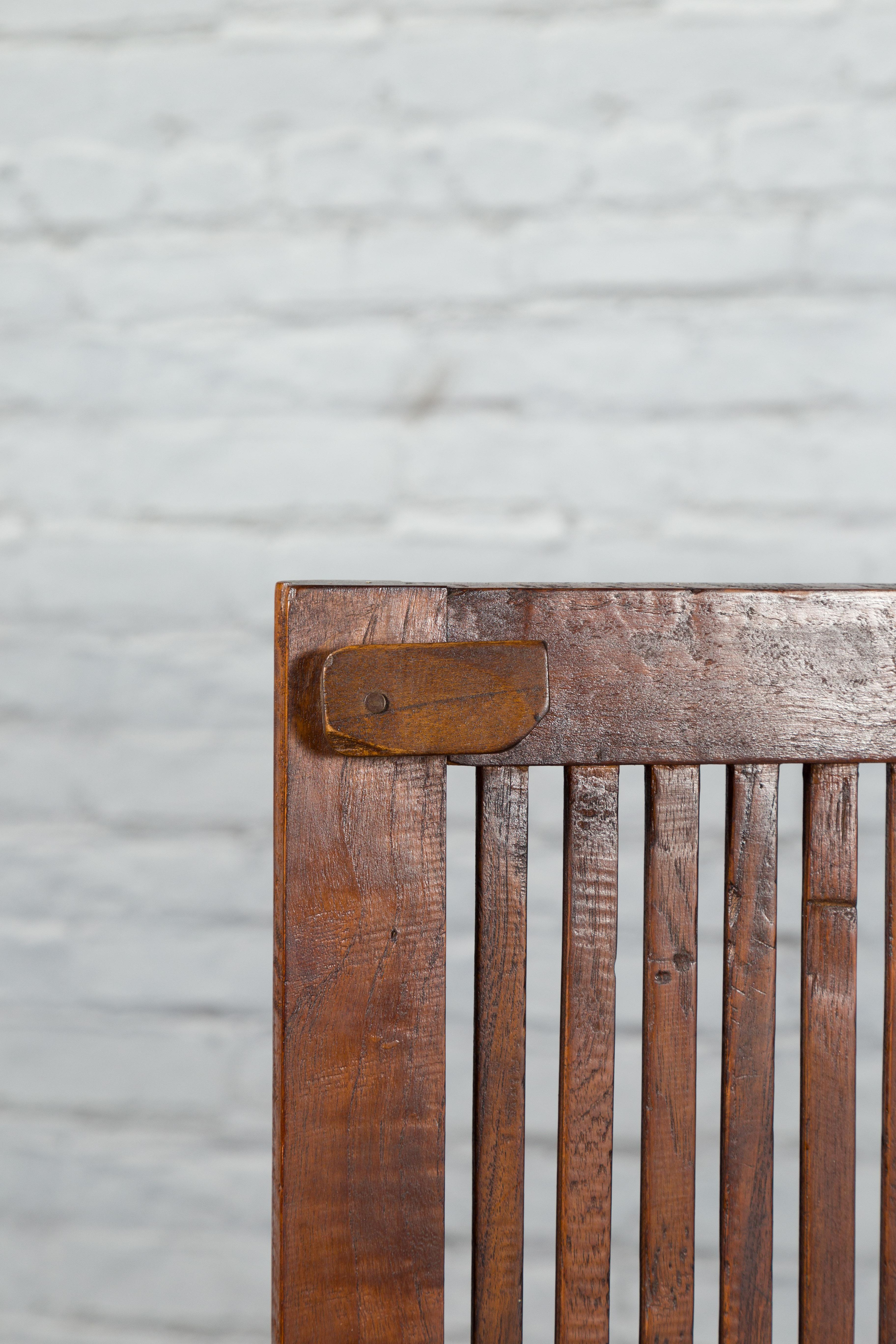 Javanese Antique Teak Armoire with Slatted Motifs, Tapered Feet and Patina For Sale 2