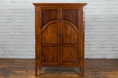 Javanese Antique Teak Armoire with Slatted Motifs, Tapered Feet and Patina