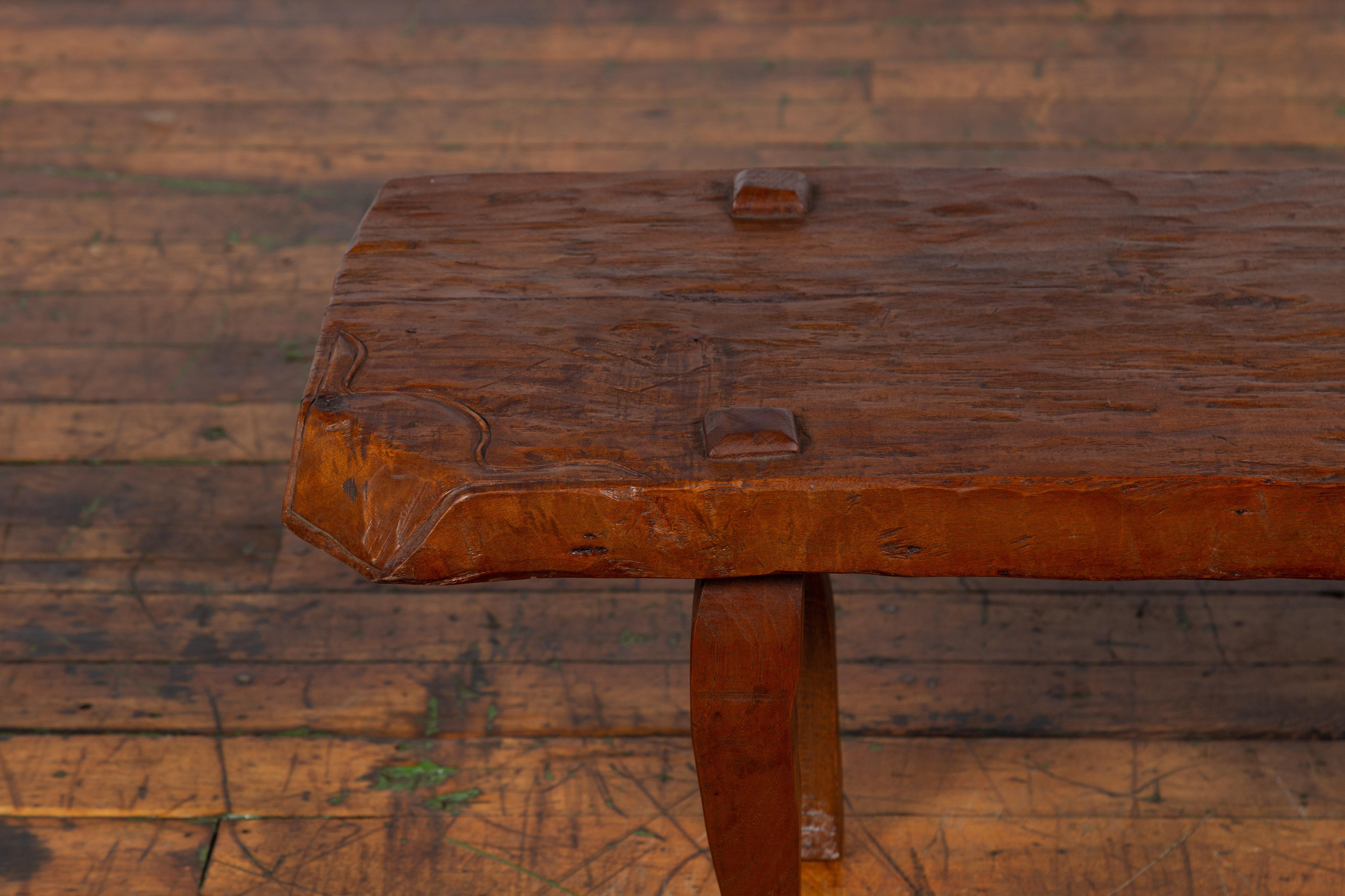 Carved Javanese Arts & Crafts Teak Table with Recessed Legs and Distressed Appearance For Sale