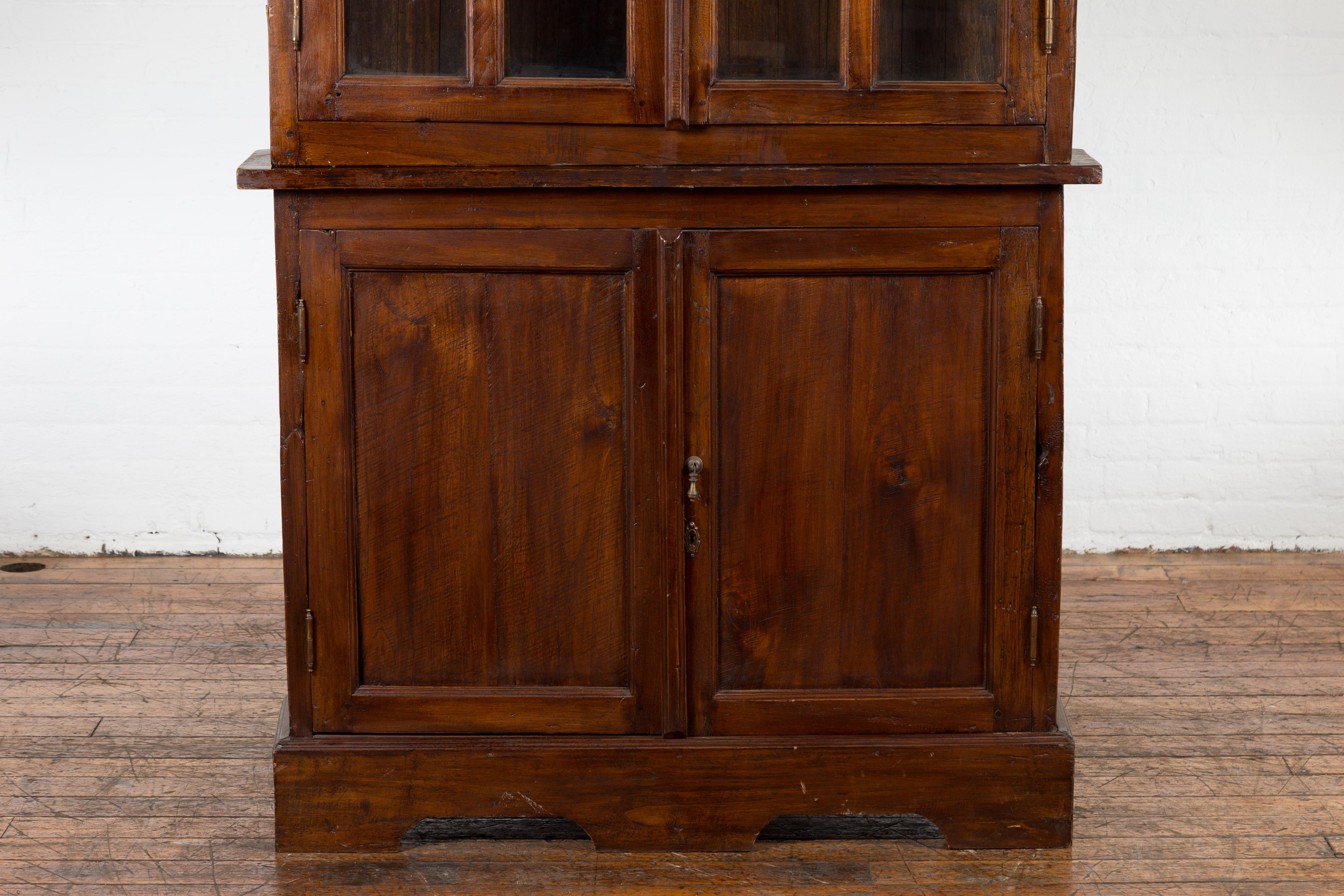 Javanese Dutch Colonial Two Part Display Corner Cabinet with Glass Doors In Good Condition For Sale In Yonkers, NY