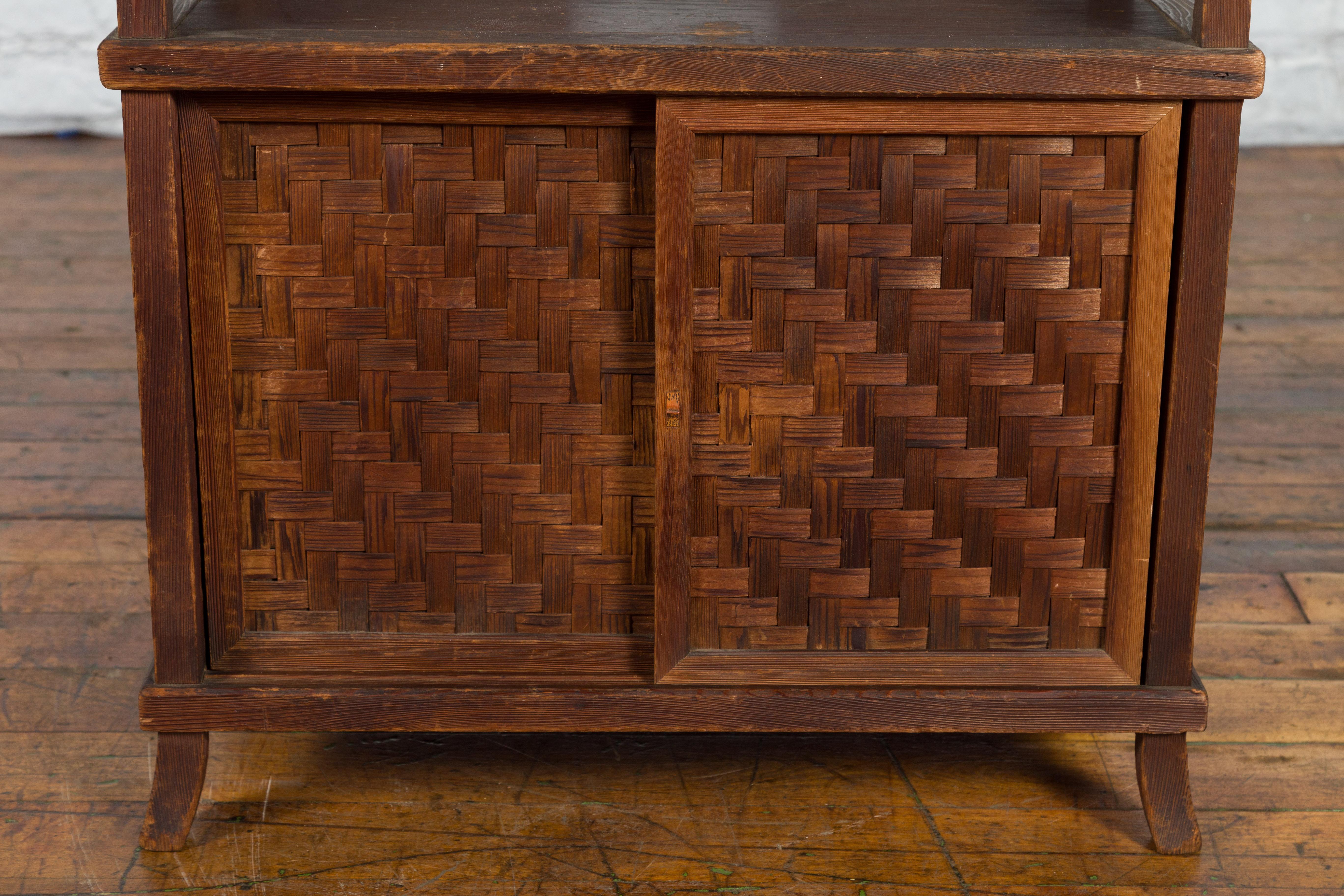 Javanese Vintage Side Cabinet with Latticed Bamboo Sliding Doors and Gallery For Sale 4