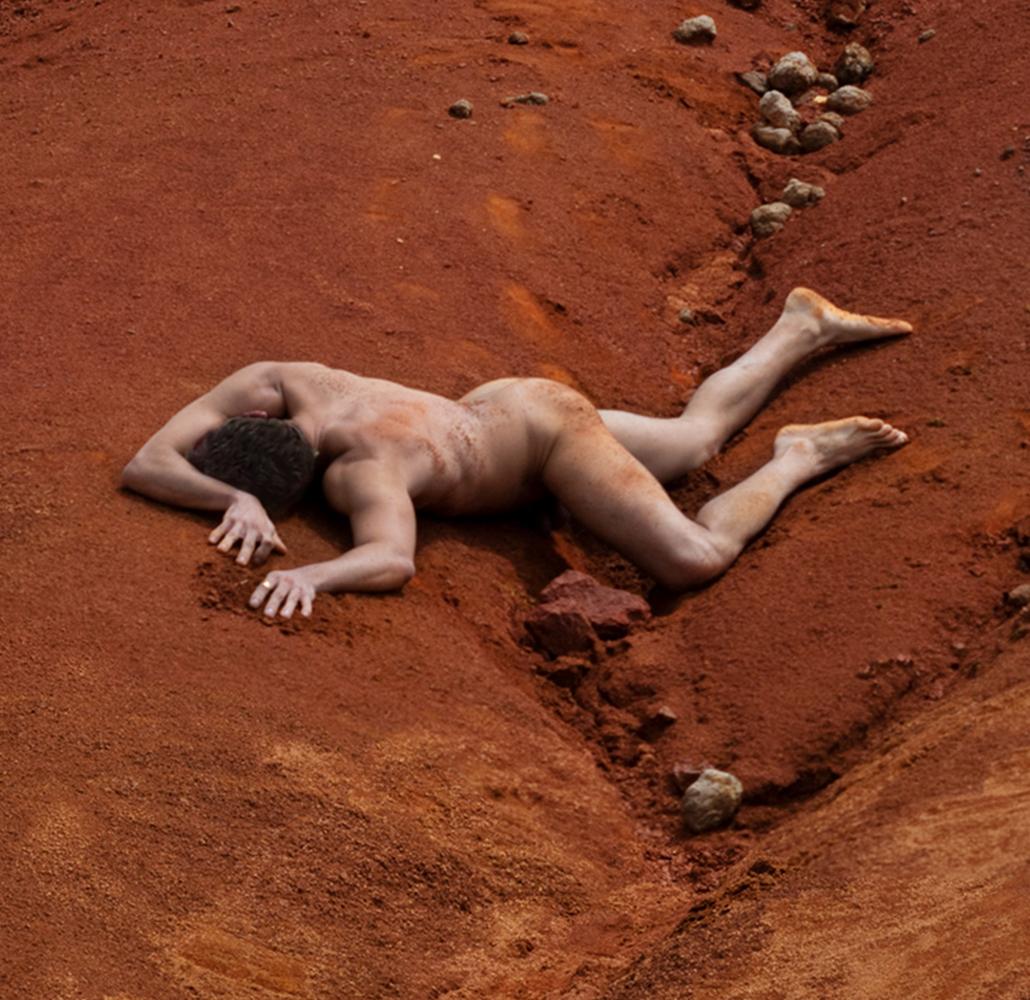 Engulfment, Mosquera 1a. Nude in a landscape color photograph - Contemporary Photograph by Javier Rey