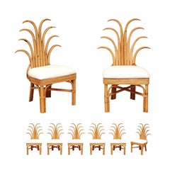 Ensemble exquis de 8 chaises de salle à manger vintage en rotin et palmes de canne, circa 1950