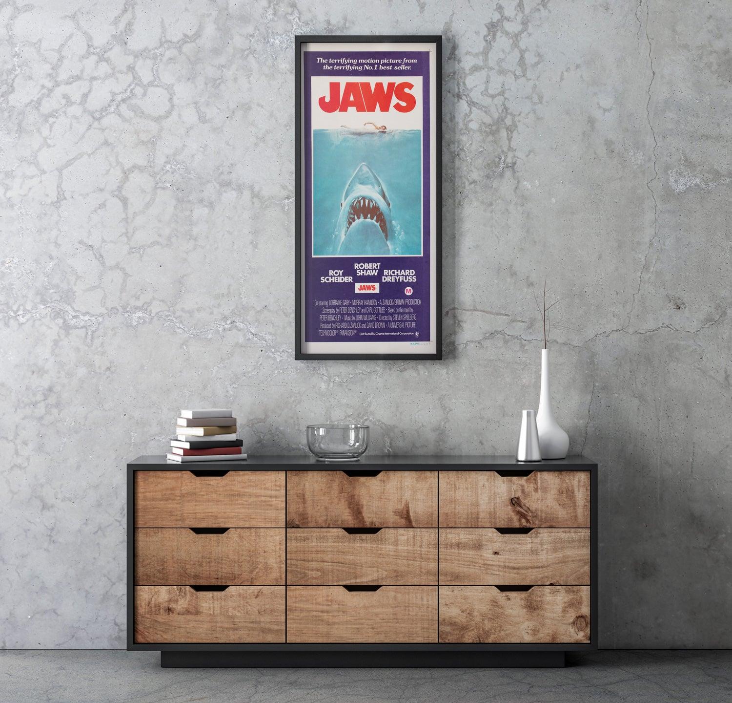 Featuring the same classic Roger Kastel artwork, the Jaws Australian Daybill is a great, collectable item and more affordable alternative to the country-of-origin US poster.

This vintage movie poster is sized 13 1/2 x 30 inches. It will be sent