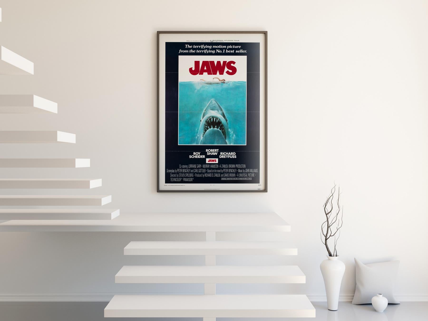 The poster with plenty of bite.

The original country-of-origin US 1 sheet film poster for Steven Spielberg’s seminal 70s Shark chiller Jaws, featuring the classic Roger Kastel artwork. Fantastic unrestored tri-folded condition. It is very hard to