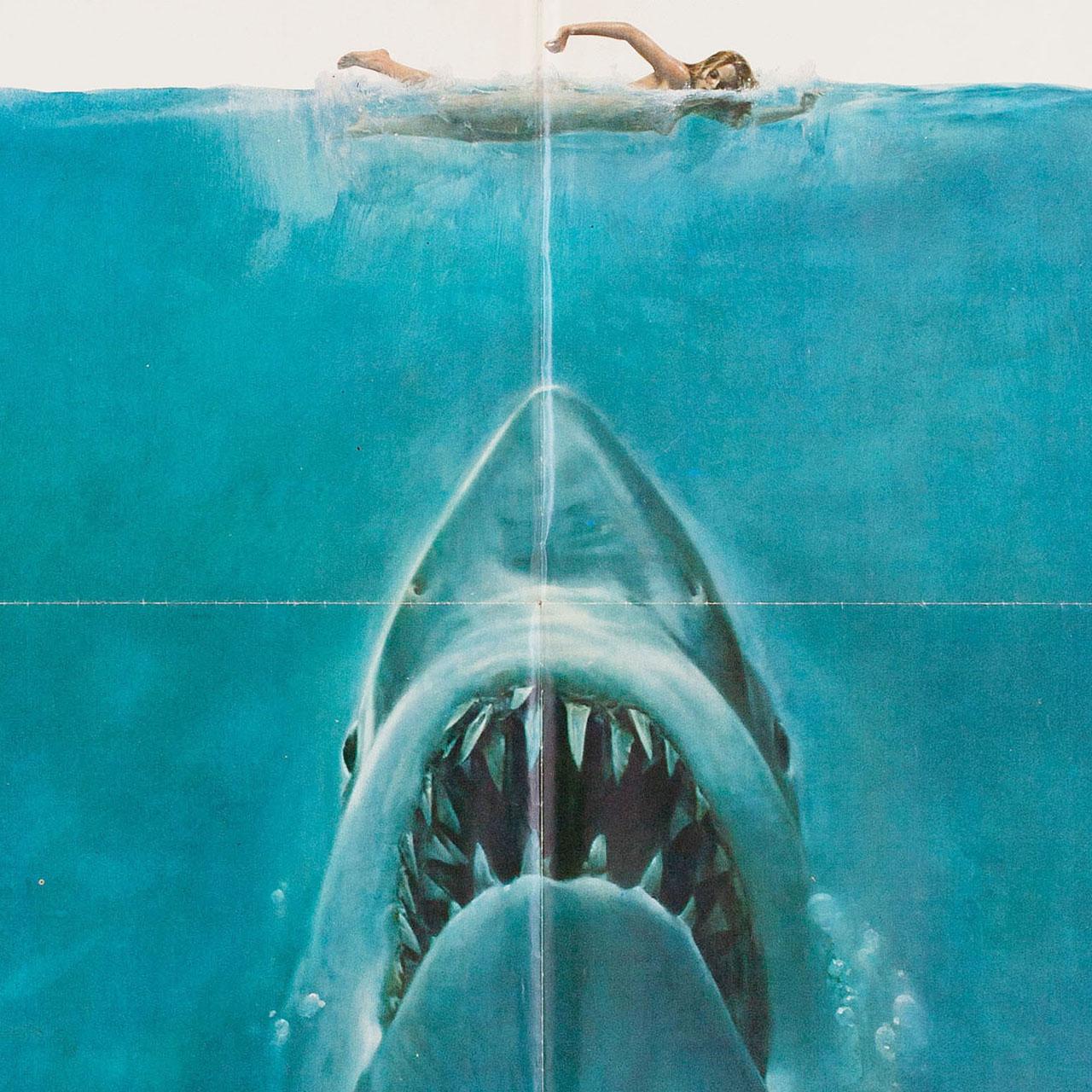 Original 1975 U.S. one sheet poster by Roger Kastel / Tony Seiniger for the 1975 film Jaws directed by Steven Spielberg with Roy Scheider and Robert Shaw. Very good-fine condition, folded with pinholes. Many original posters were issued folded or