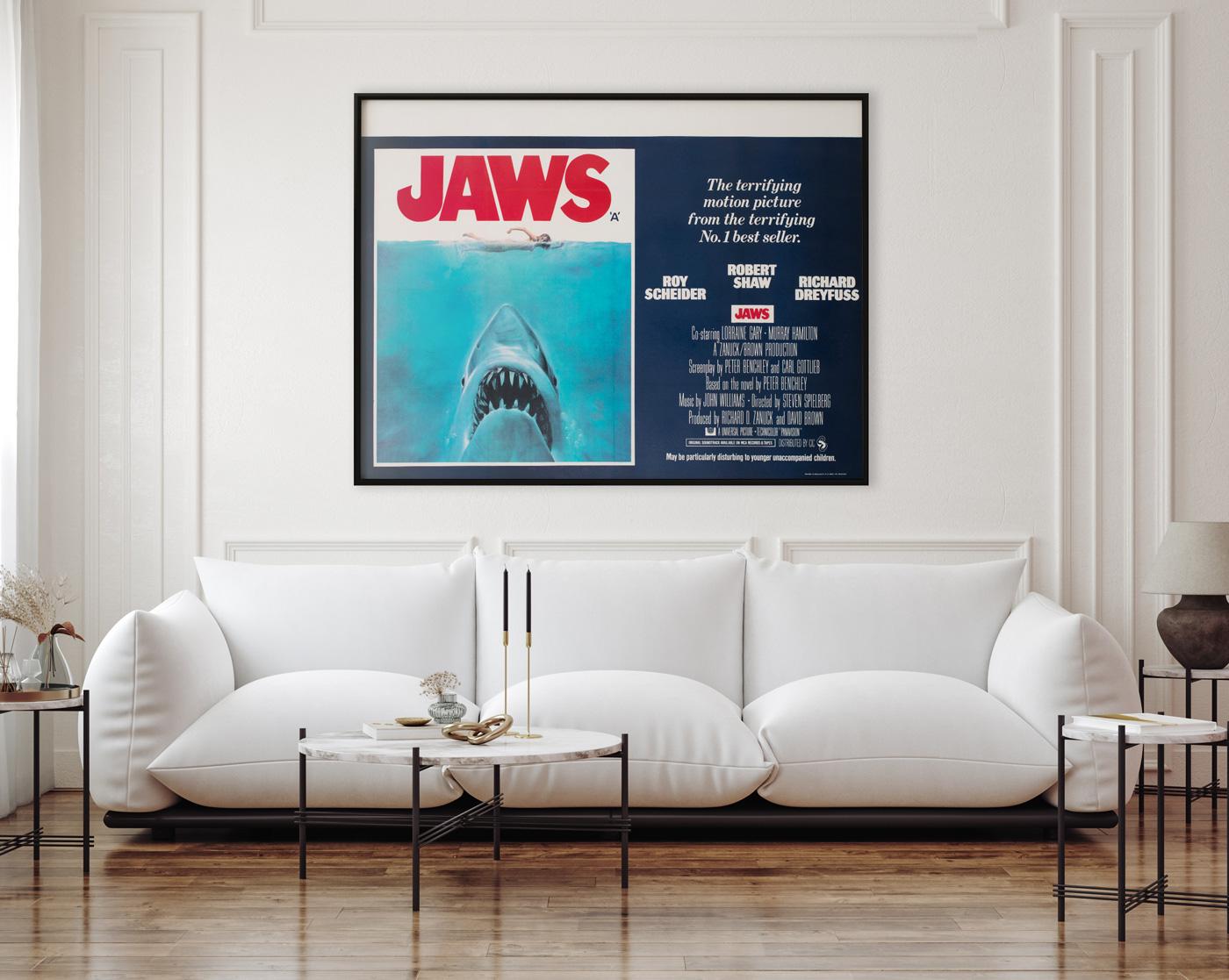 The poster with plenty of bite.

The UK Quad for Steven Spielberg’s seminal 70s Shark chiller Jaws, featuring the classic Roger Kastel artwork. In excellent unrestored condition. 

This vintage movie poster is sized 30 3/4 x 39 1/2 inches (plus a