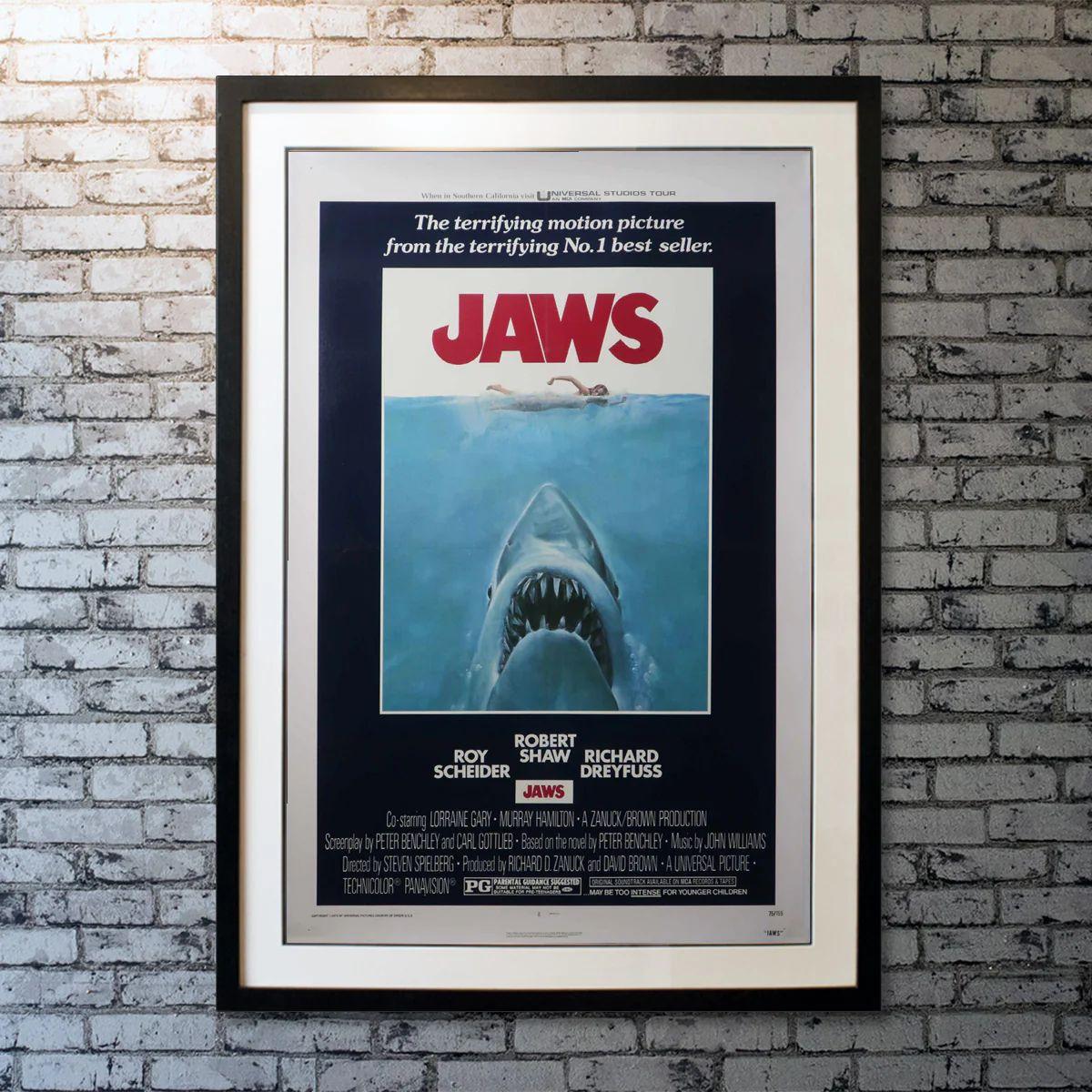 Jaws, Unframed Poster, 1975

Original One Sheet (27 X 40 Inches). When a killer shark unleashes chaos on a beach community off Cape Cod, it's up to a local sheriff, a marine biologist, and an old seafarer to hunt the beast down.

Additional
