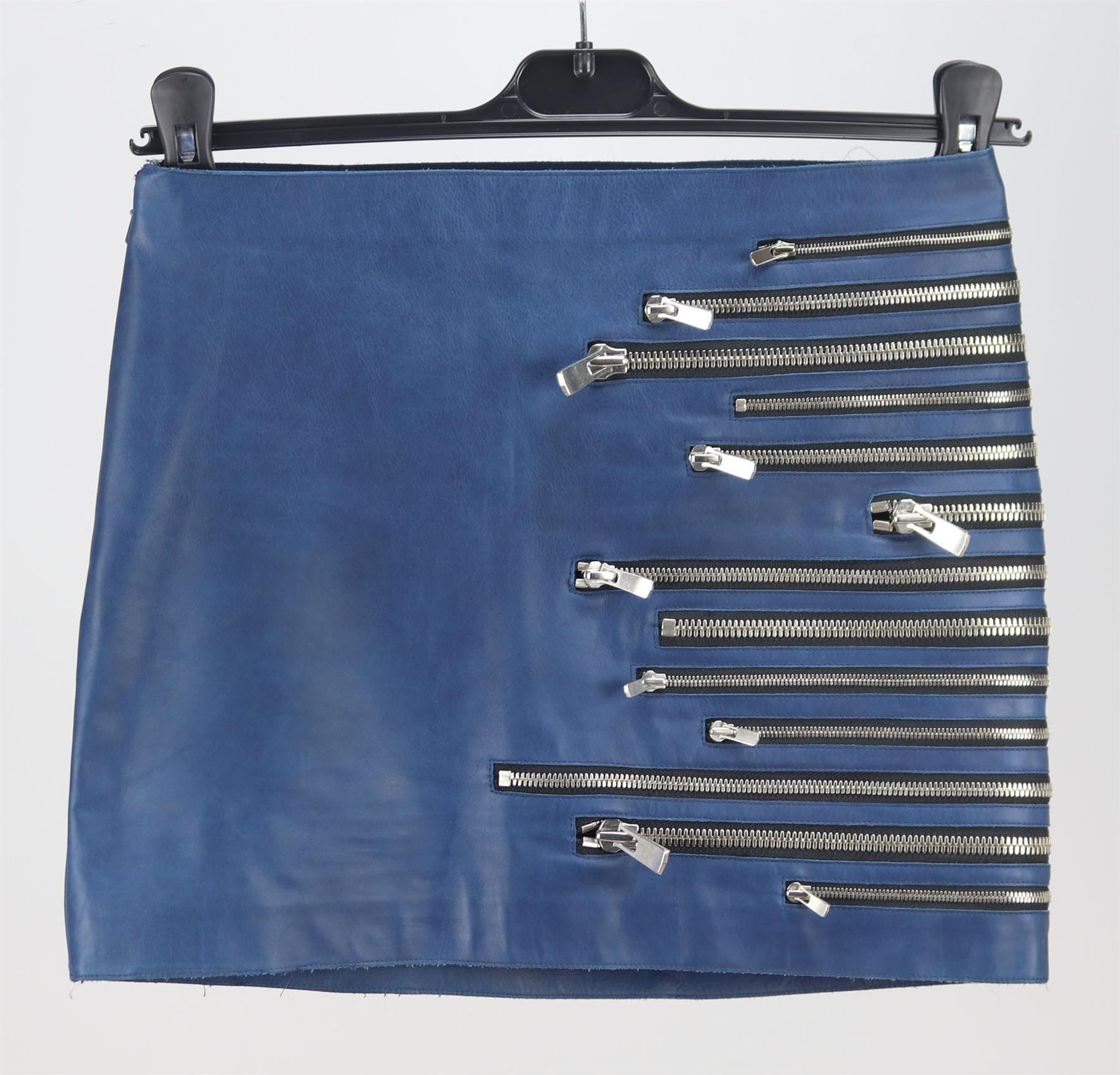 This Jay Ahr mini skirt are at the top of our wish list this season, it is cut from royal-blue leather version is detailed with fully functioning zips down the side - you decide how much or how little to reveal. 
Blue leather. 
Concealed zip