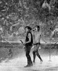 The Rolling Stones Mick Jagger, Keith Richards in Dallas rainstorm