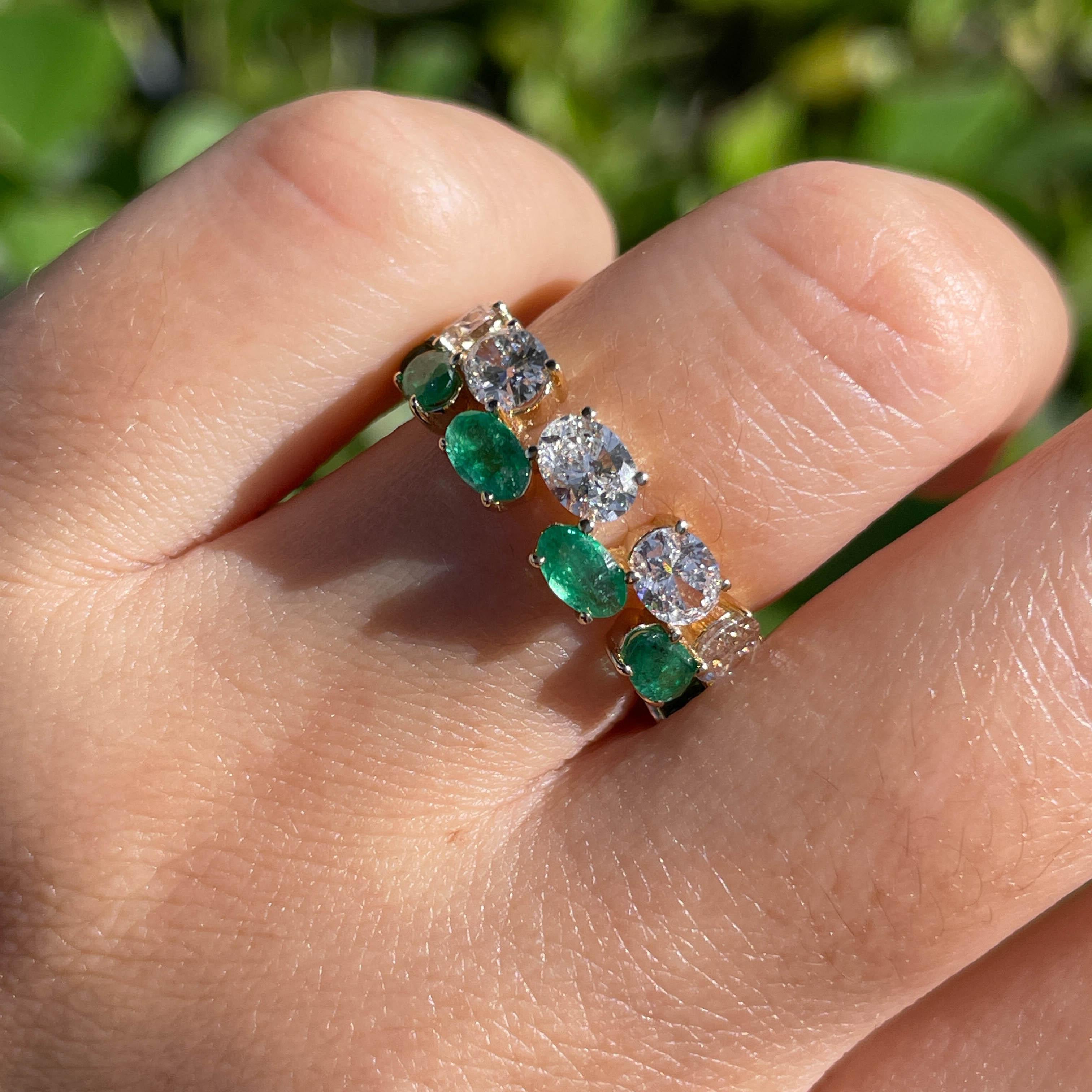 Jay Feder 14k Yellow Gold Emerald and Diamond Band Ring

Set with 2.0ct Oval Green Emeralds and 1.55ct Oval Diamonds. 

The ring is 6.40mm wide; sits 3.24mm from the top of the finger. Ring size is 6 (not-sizable). Total weight is 3.8 grams.