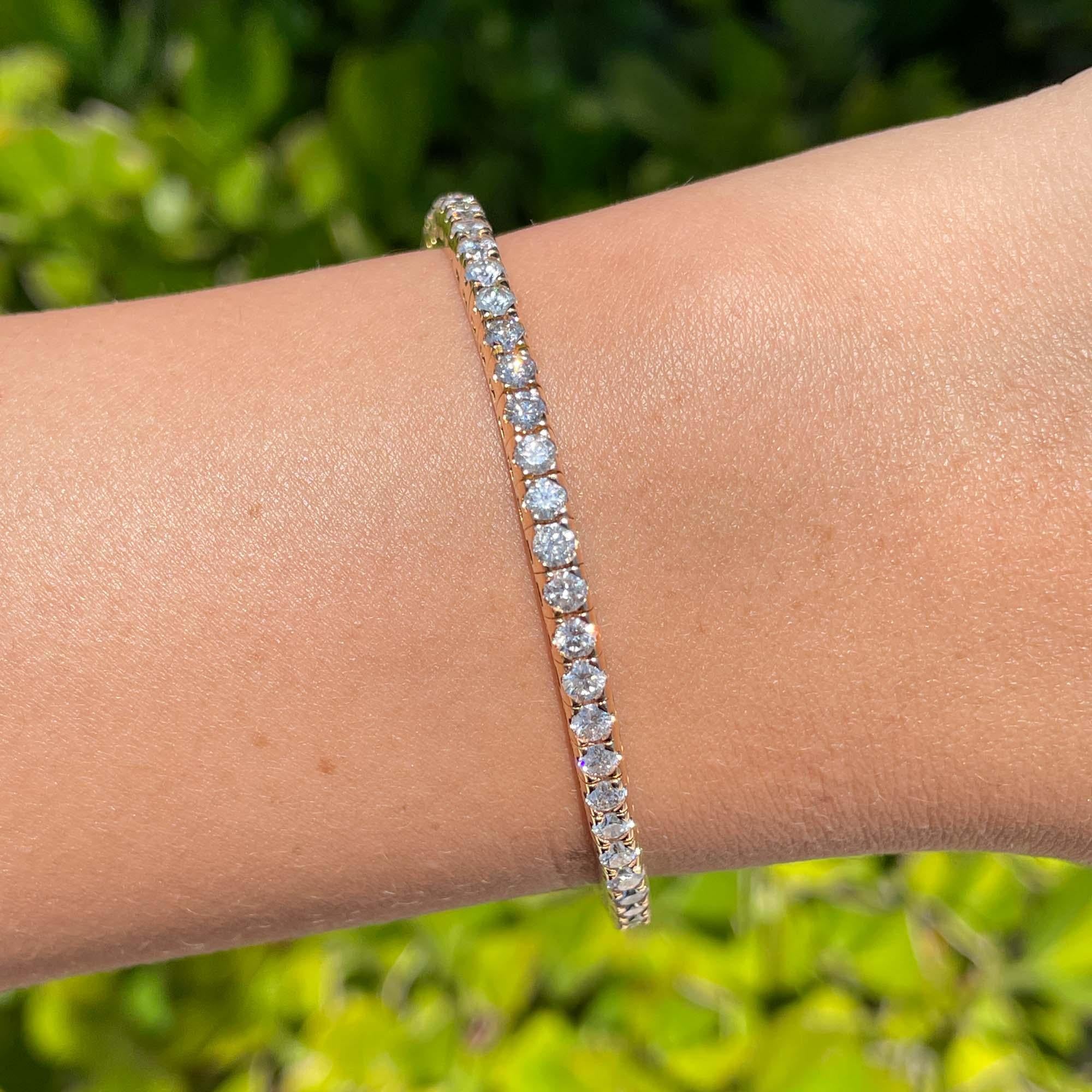 Jay Feder 18k Rose Gold Diamond Tennis Stretch Bracelet

Set with 62 round brilliant diamonds; total carat weight is 5.30ct.

The bracelet is 2.5 inches in diameter and 3.30mm wide. Total weight is 18.7 grams.

Please view our photos and videos for