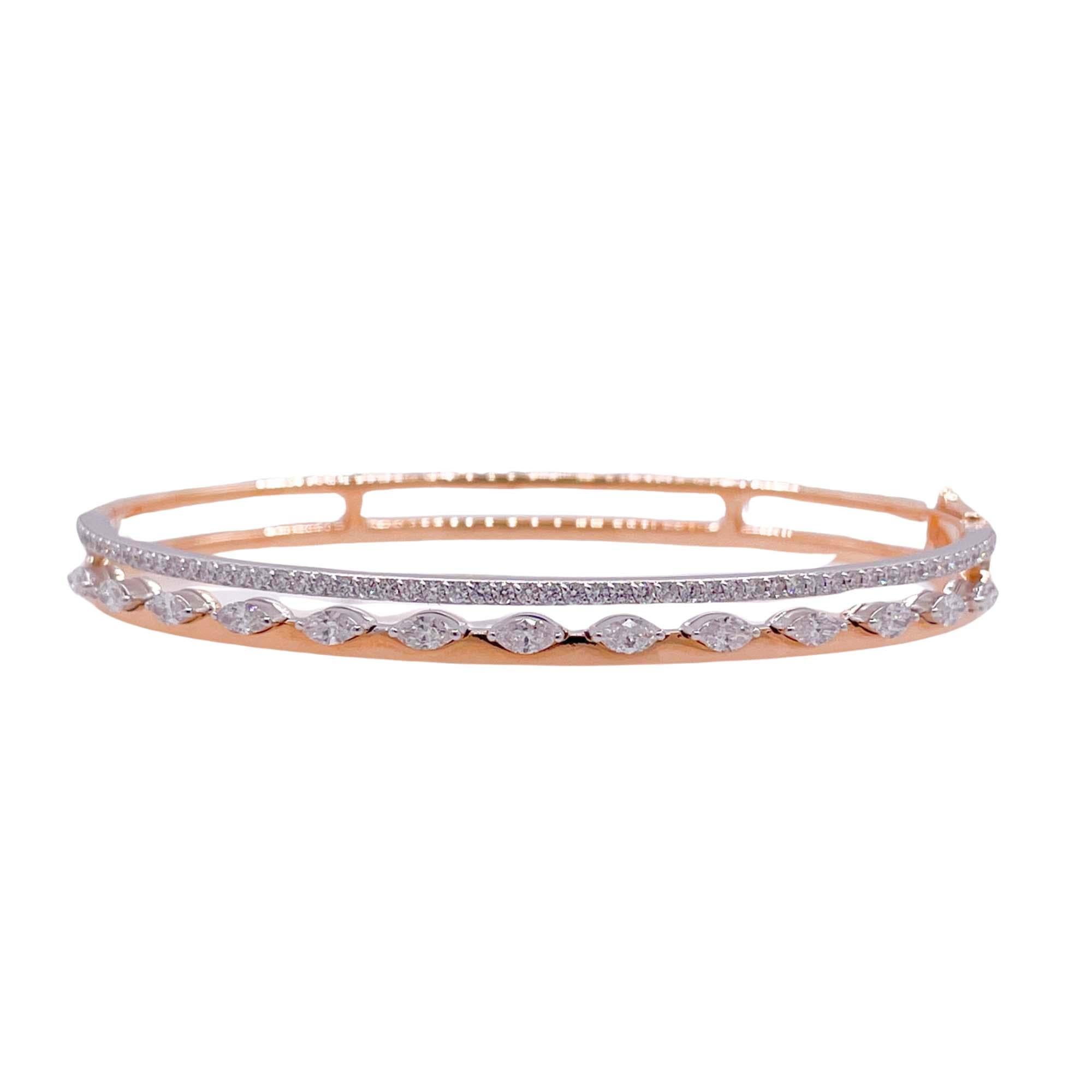 Jay Feder Bracelet jonc en or bicolore 18 carats avec diamants

Serti de diamants marquises et ronds ; poids total en carats : 1,34 ct.

Le bracelet a un diamètre de 2,5 pouces et une largeur de 4,95 mm. Le poids total est de 16.9 grammes.

Veuillez