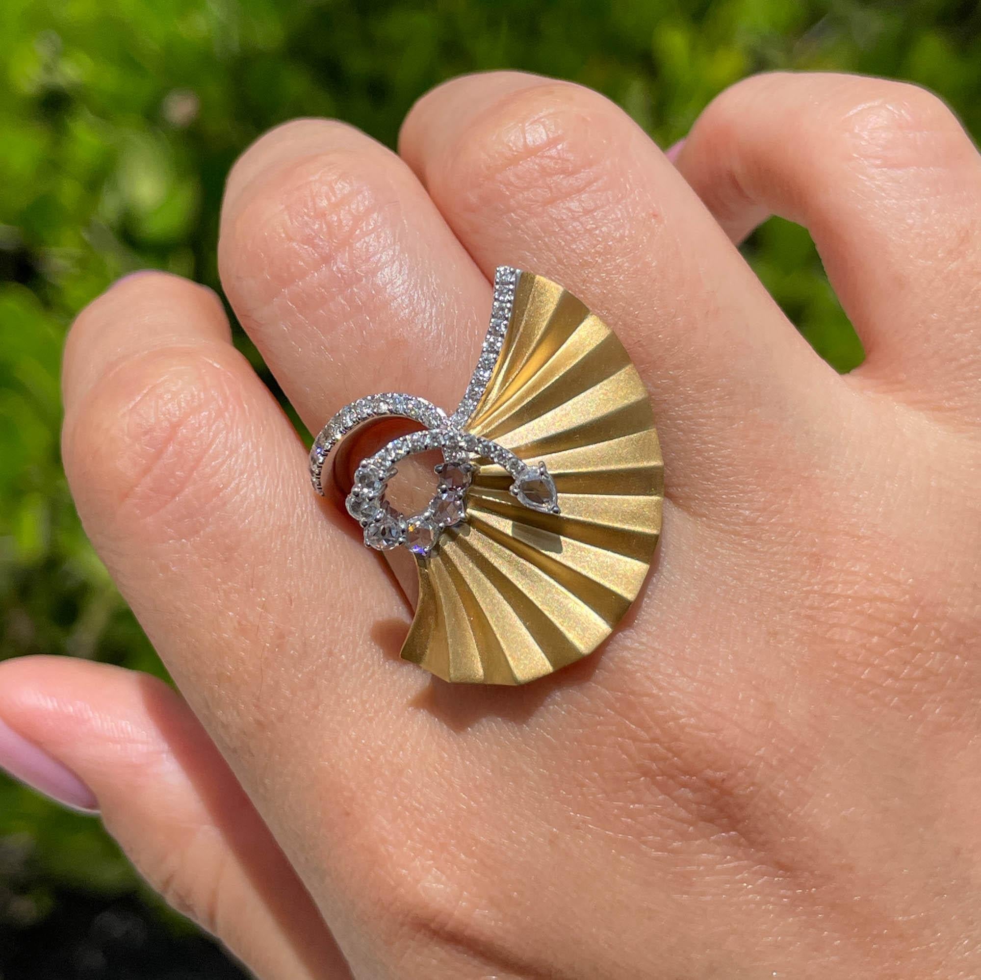 Jay Feder 18k Two Tone Gold Diamond Fan Plisse Ring; total weight of all diamonds is 0.81 carats.

The top's measurements are 31x24mm. The band tapers from 2.15mm to 5.19mm on the bottom. Sits 8.49mm from the top of the finger. The ring size is 6