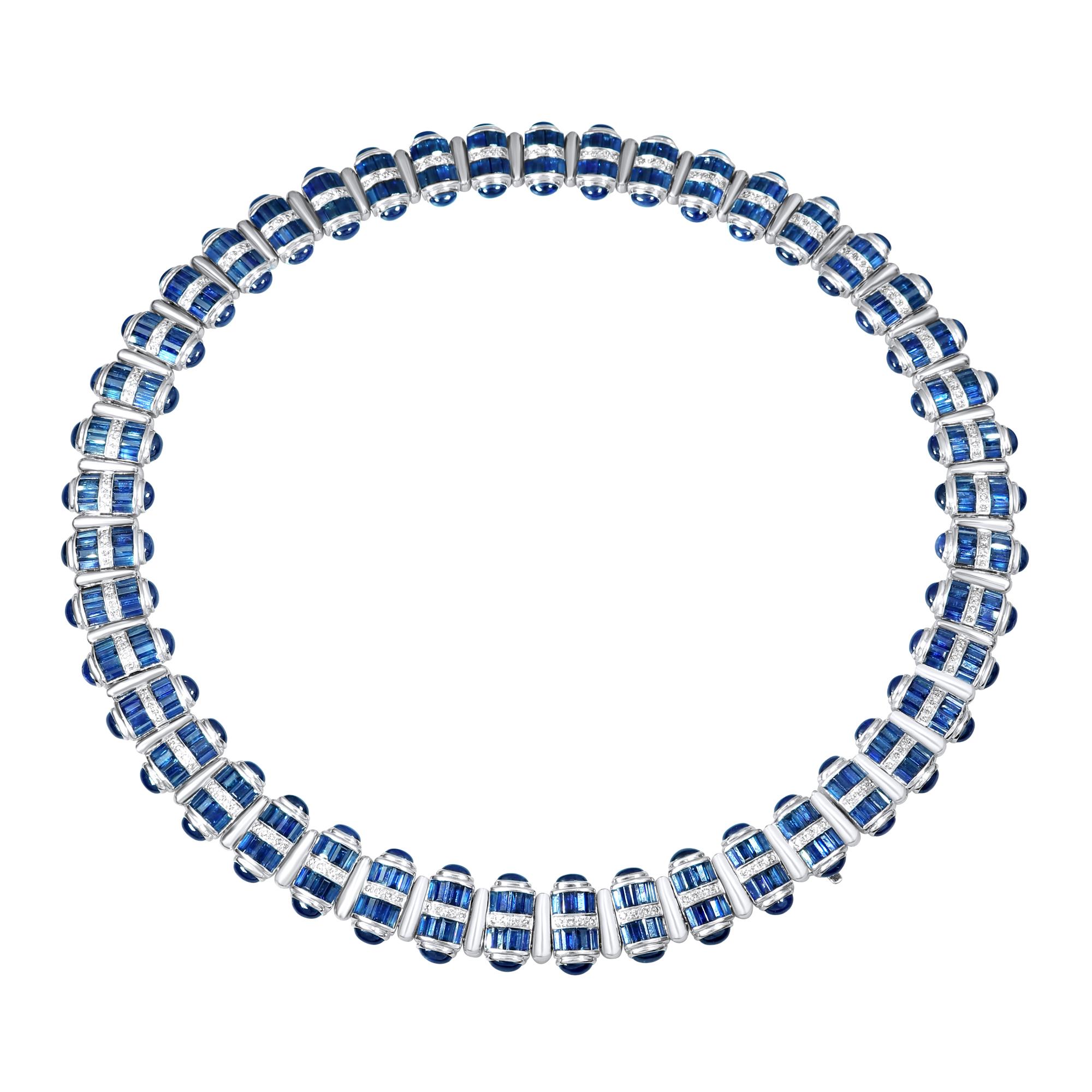 Jay Feder 18k White Gold Cabochon Sapphire Diamond Necklace
The necklace is approx. 16 inches long and 15.36mm wide.
The total weight of the necklace is 103.8 grams.

Please view our photos and videos for more details.

Good condition, minor