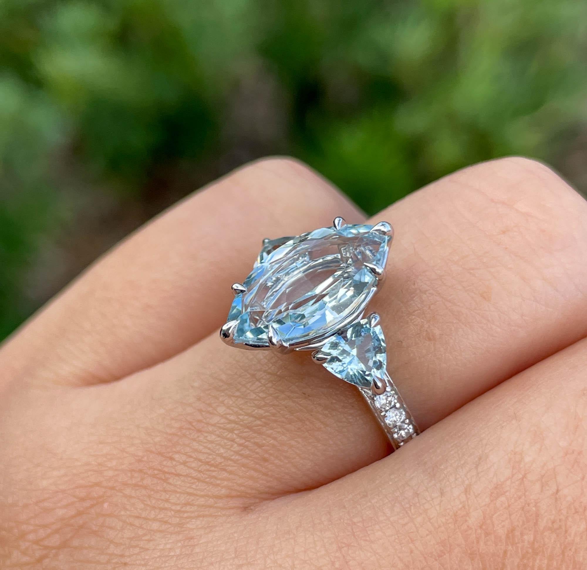 aquamarine engagement ring on hand