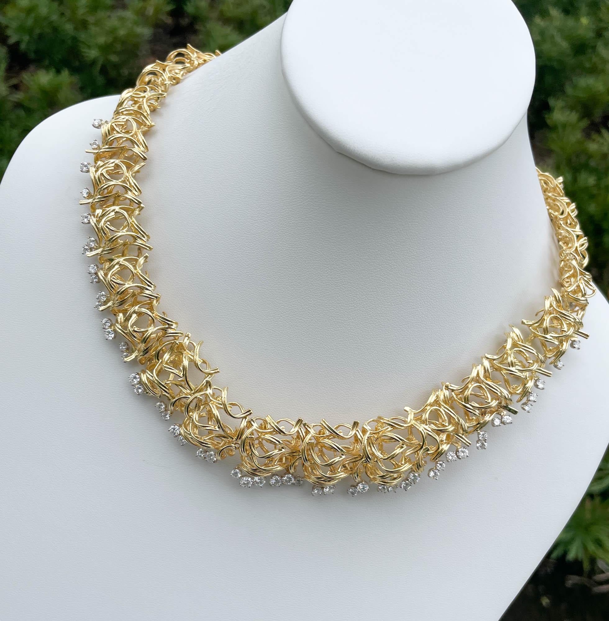 Jay Feder 18k Yellow Gold Diamond Filigree Branch Necklace
There are 52 round brilliant diamonds; estimated total weight is 4.00 carats. 
The necklace is 18.5 inches long and width tapers from 12mm at the clasp to 25mm in the middle.
Total weight of