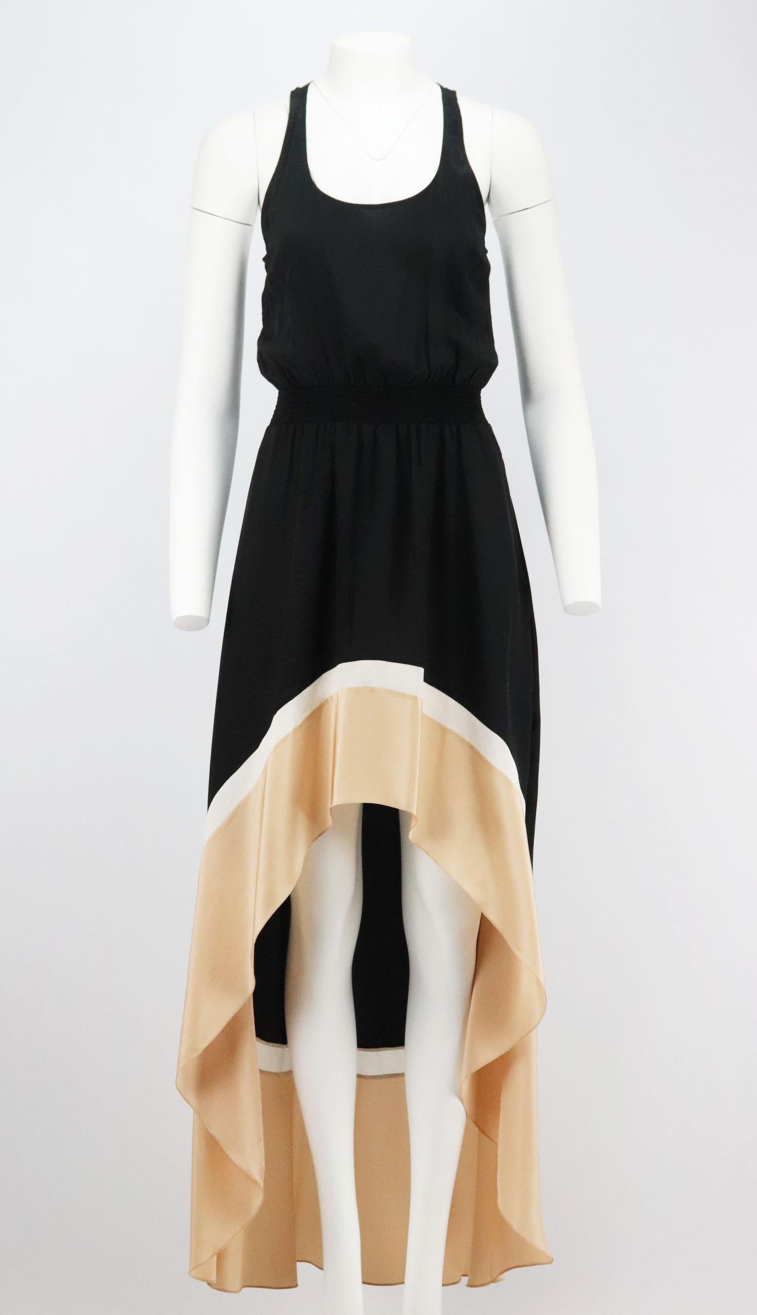 This floaty dress by Jay Godfrey is cut from silk that drapes loosely over your body and is finished with a elasticated cinched in waist and high-low asymmetric hem.
Black, beige and white silk.
Slips on.
100% Silk.

Size: US 6 (UK 10, FR 38, IT