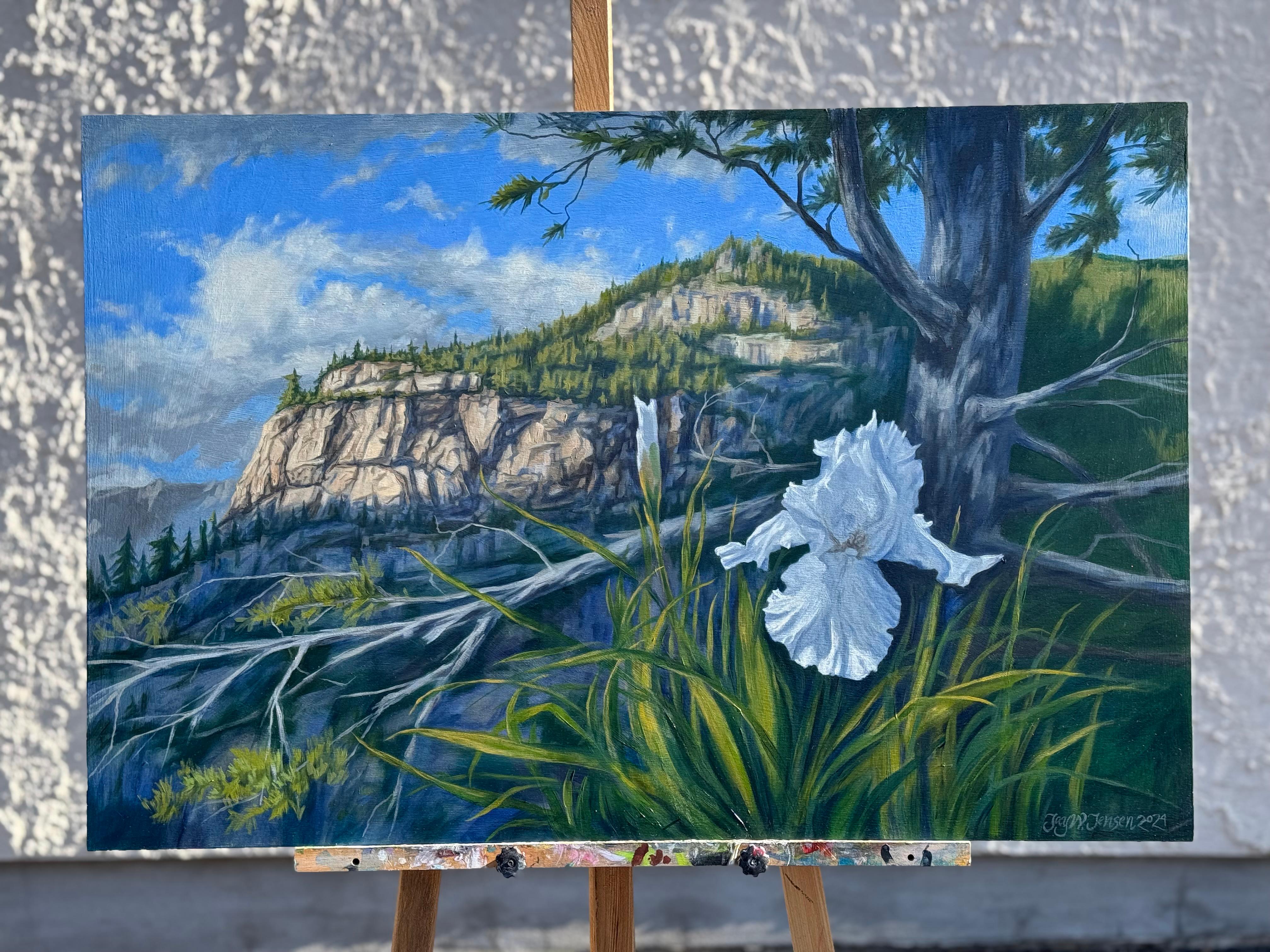 <p>Artist Comments<br />A white iris blooms in the foreground, standing in contrast to the Rocky Mountains in the distance. The afternoon sun and shade reveal the ruggedness of the landscape and the charm of the flower. Artist Jay Jensen conceived