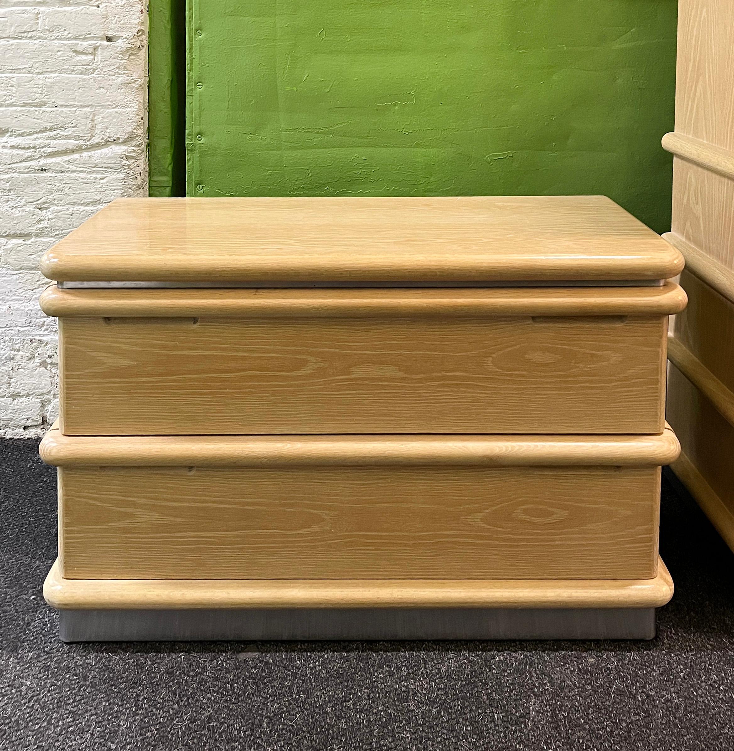 This is one absolutely beautiful Jay Spectre for Century Furniture bleached oak 2 door chest of drawers with brushed steel base 1980s (Signed). This piece features two drawers with hidden pulls. The craftmanship of Jay Spectre’s pieces is absolute