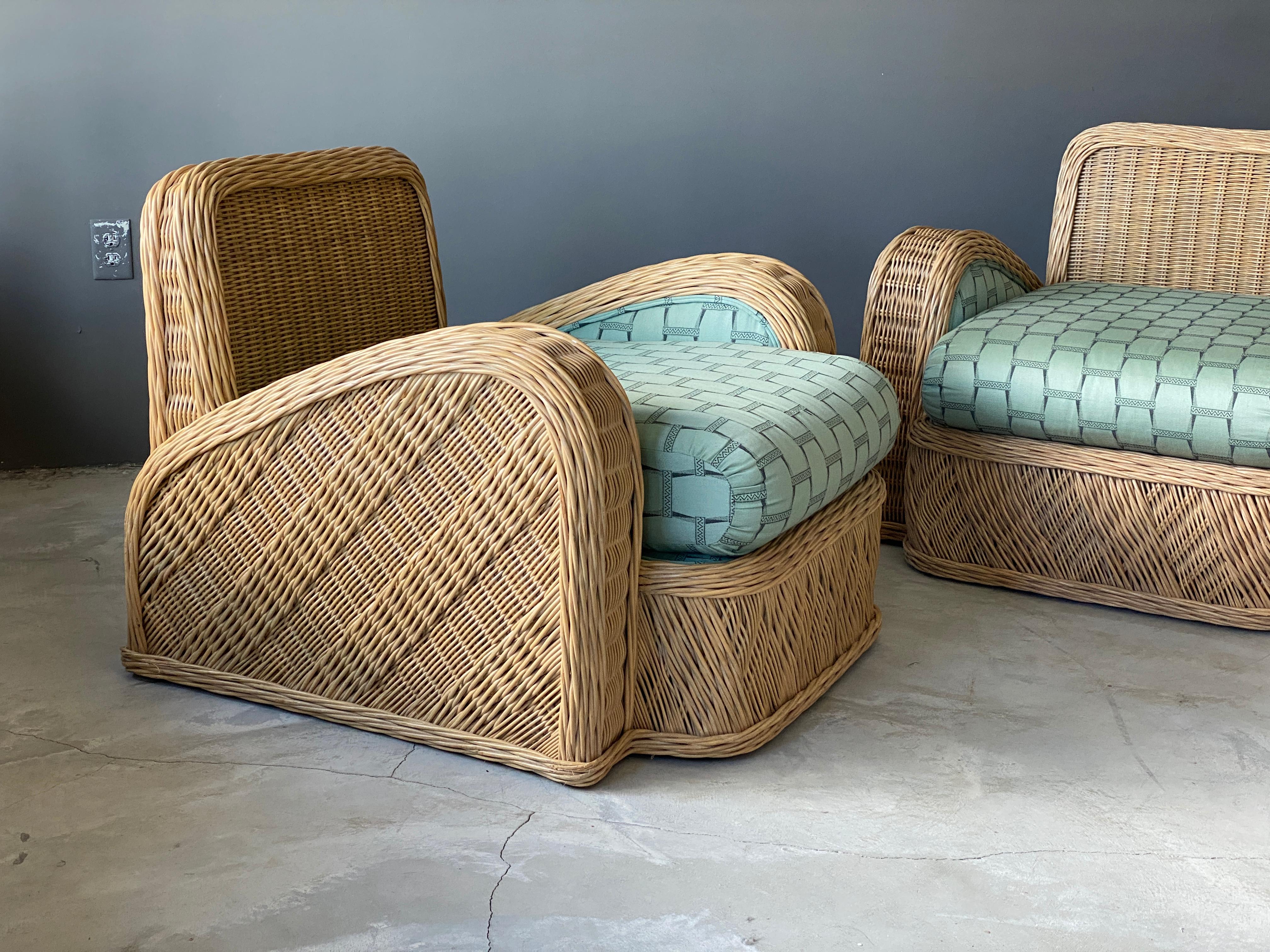 A pair of modernist lounge chairs designed by Jay Spectre. Produced in the 1980s, USA. Labeled. In intricately woven rattan.

Other designers of the period include Paul Frankl, T.H. Robsjohn-Gibbings, Paul Evans, Edward Wormley, and Tommi