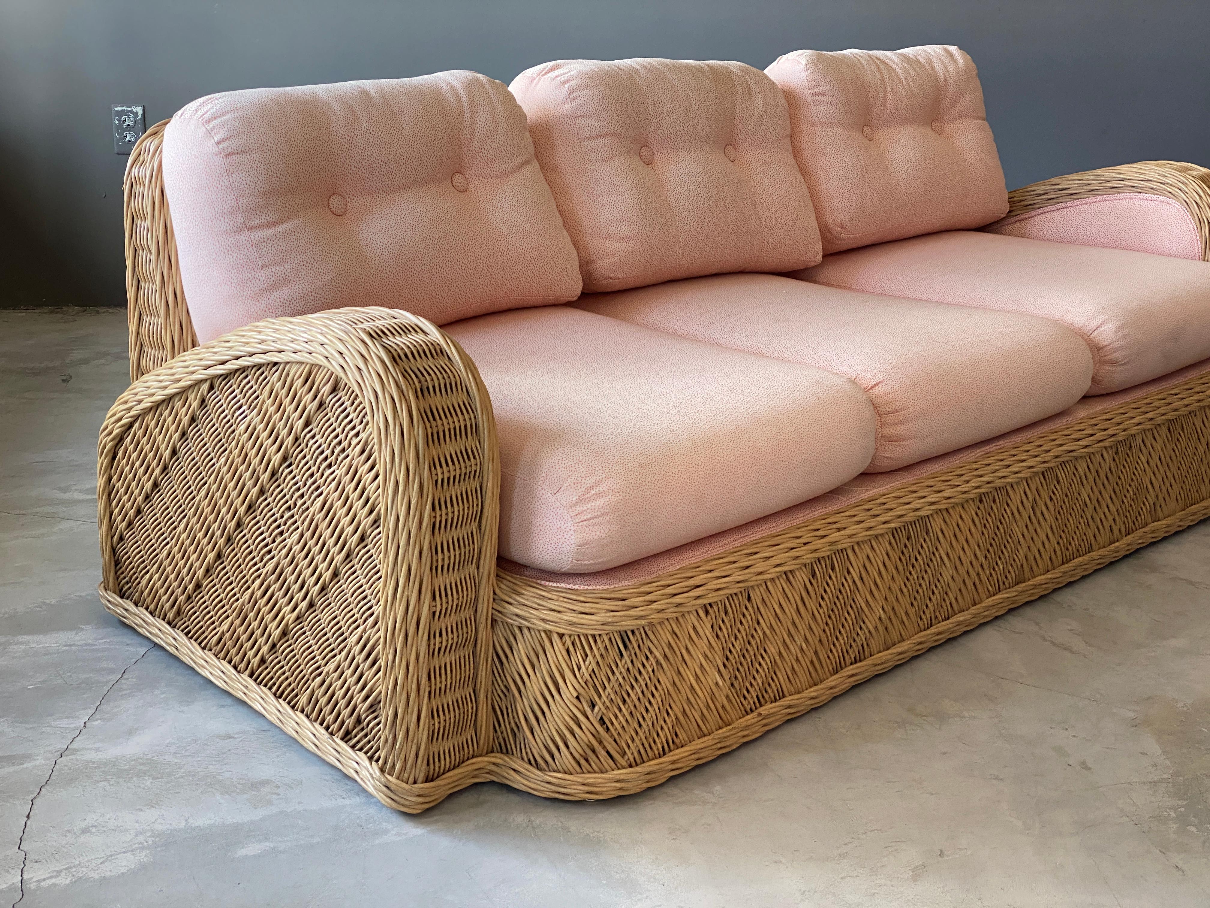 A modernist sofa designed by Jay Spectre. Produced in the 1980s, USA. Labeled. In intricately woven rattan.

Other designers of the period include Paul Frankl, T.H. Robsjohn-Gibbings, Paul Evans, Edward Wormley, and Tommi Parzinger.