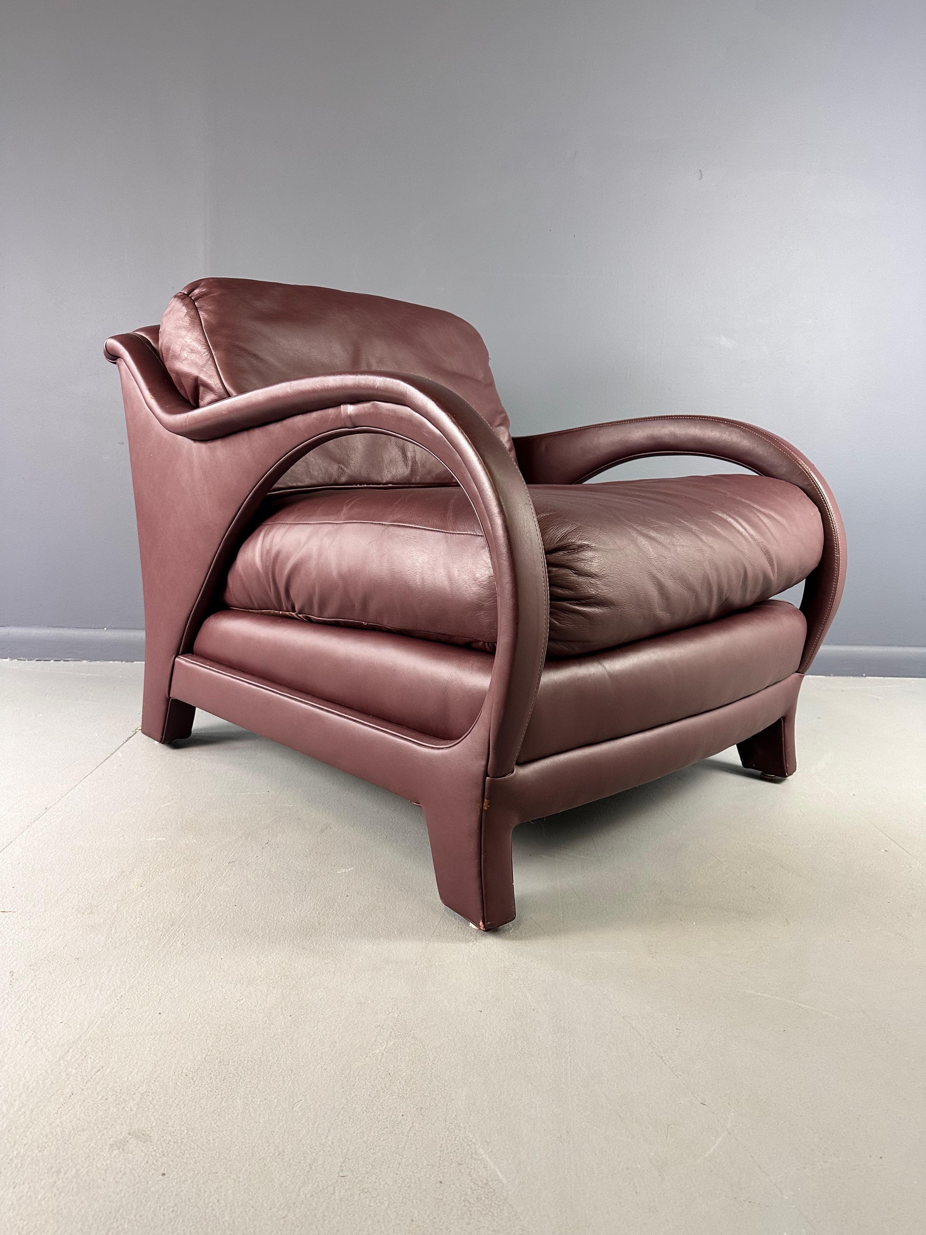 This Jay Spectre Tycoon Leather Lounge Chair in Burgundy is the perfect addition to any upscale living or office space. Crafted by renowned designer Jay Spectre, this chair offers a luxurious and sleek design, featuring high-quality leather and a