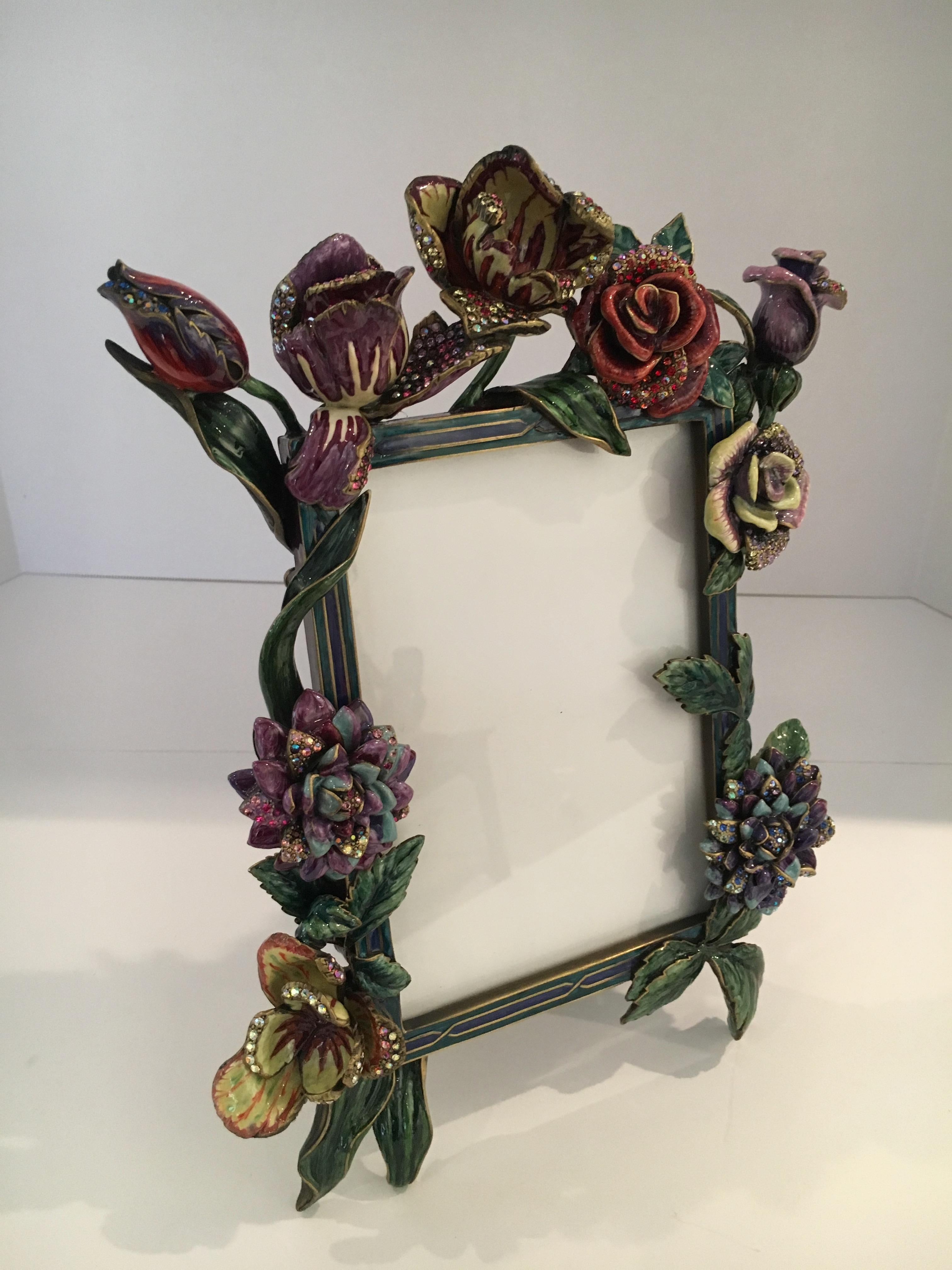 Jay Strongwater bronze and polychrome enamel photo frame - Elaborately designed foliage and flowers - a collectors piece for that perfect person and place!
The image size is 5