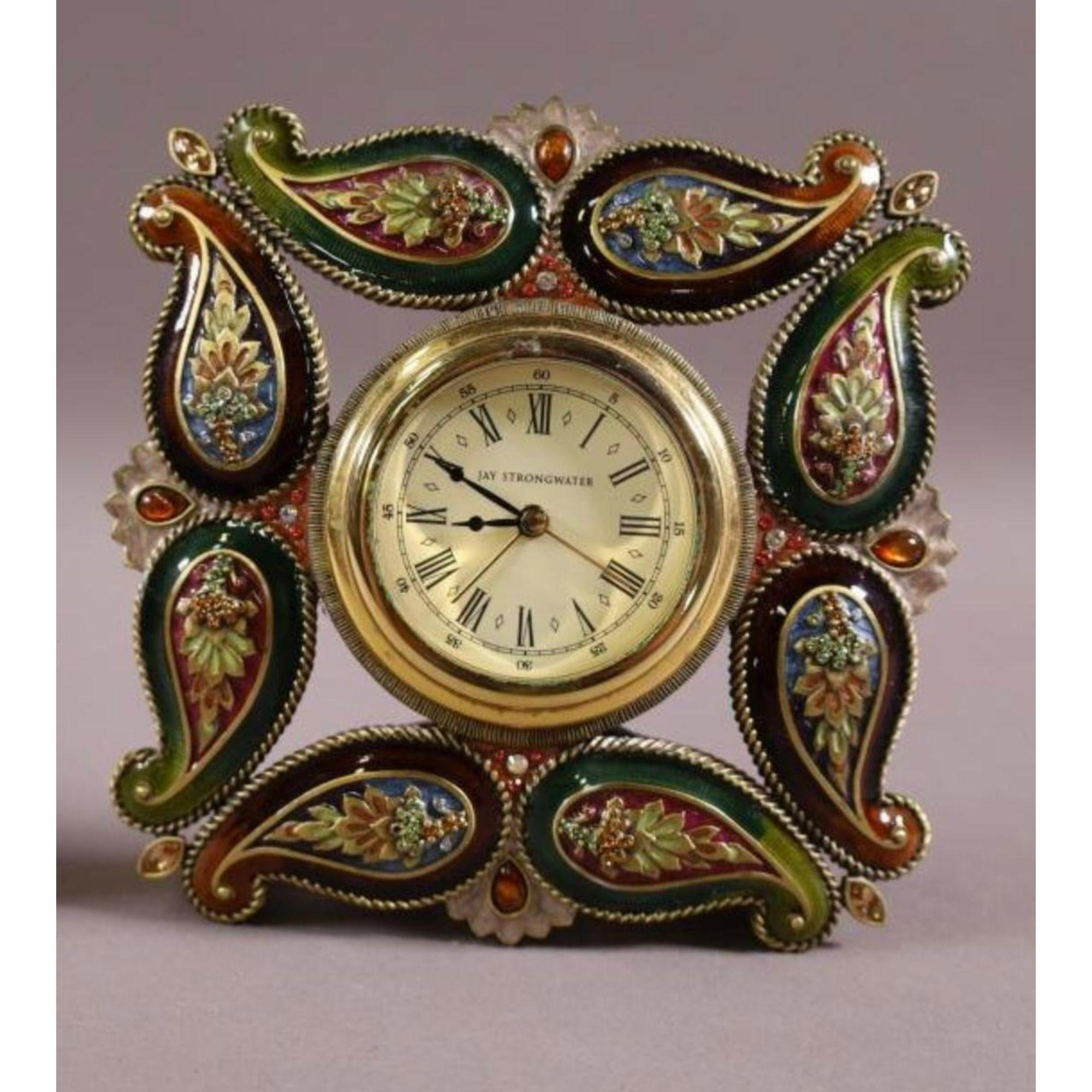 Jay Strongwater Swarovski crystal Enamel clock. It features colorful enamel decoration with Swarovski crystal details.

Additional information: 
Materials: Crystal, Enamel
Color: Green
Period: 2000 - 2009
Styles: French
Item Type: Vintage,