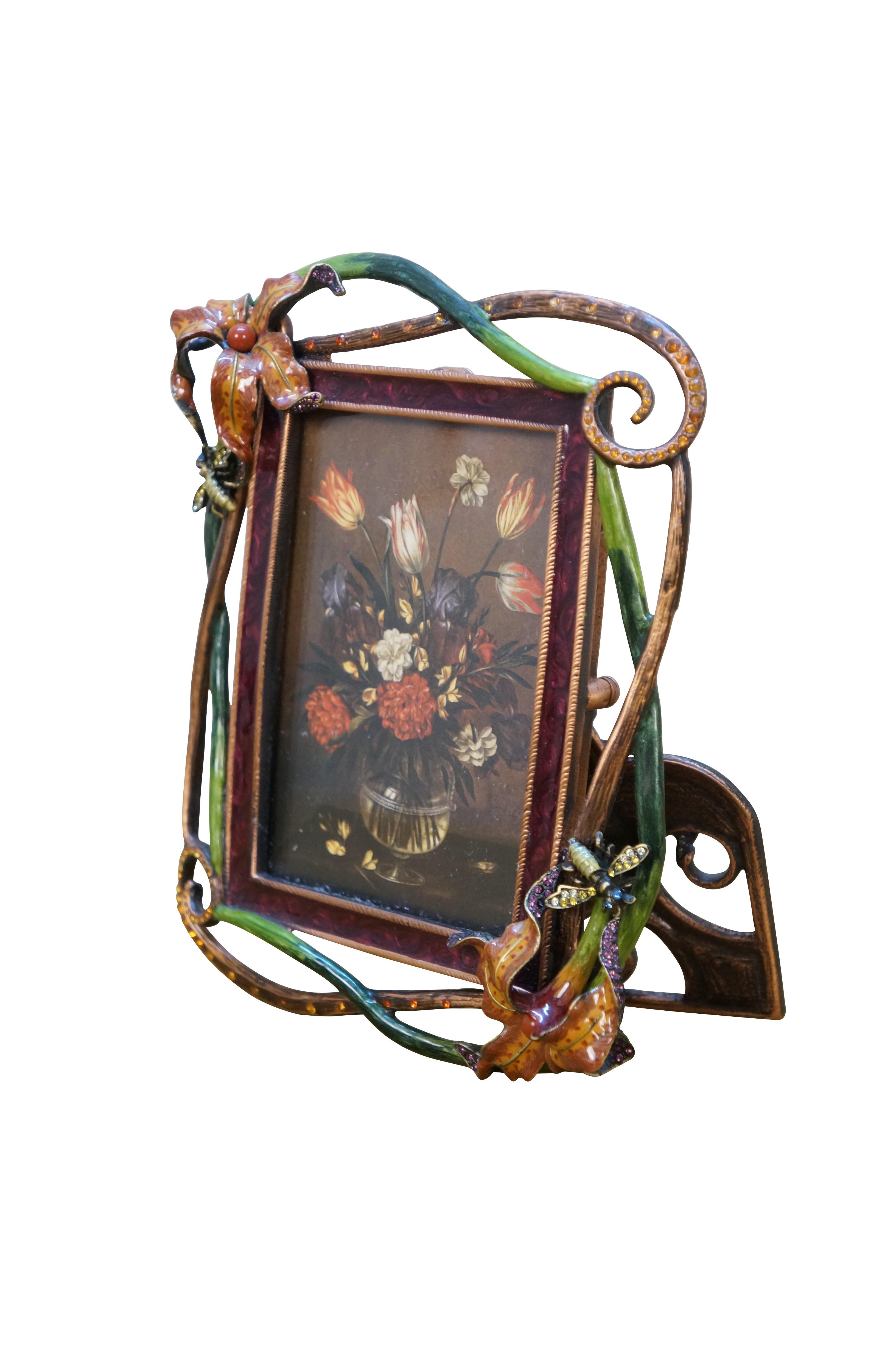 Jay Strongwater enameled brass picture frame and miniature floral print. Rectangular frame trimmed with swirling vines and enameled tiger lily blossom and bee studded with blue and gold crystals at each corner. Enameled easel style back; support