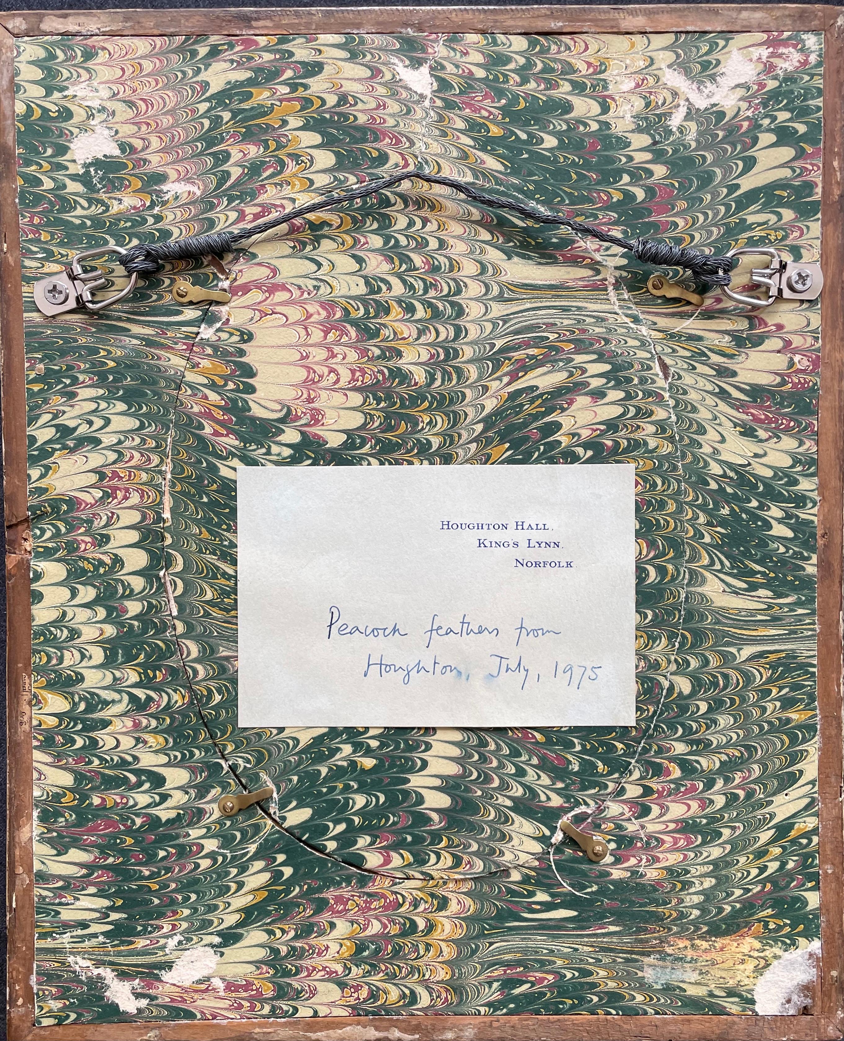 This peacock feather in an 18th-century giltwood frame comes from the estate of Jayne Wrightsman, the great collector, the Metropolitan Museum benefactor, and socialite, who died at the age of 100 in 2019. Affixed to the back of the frame is a label