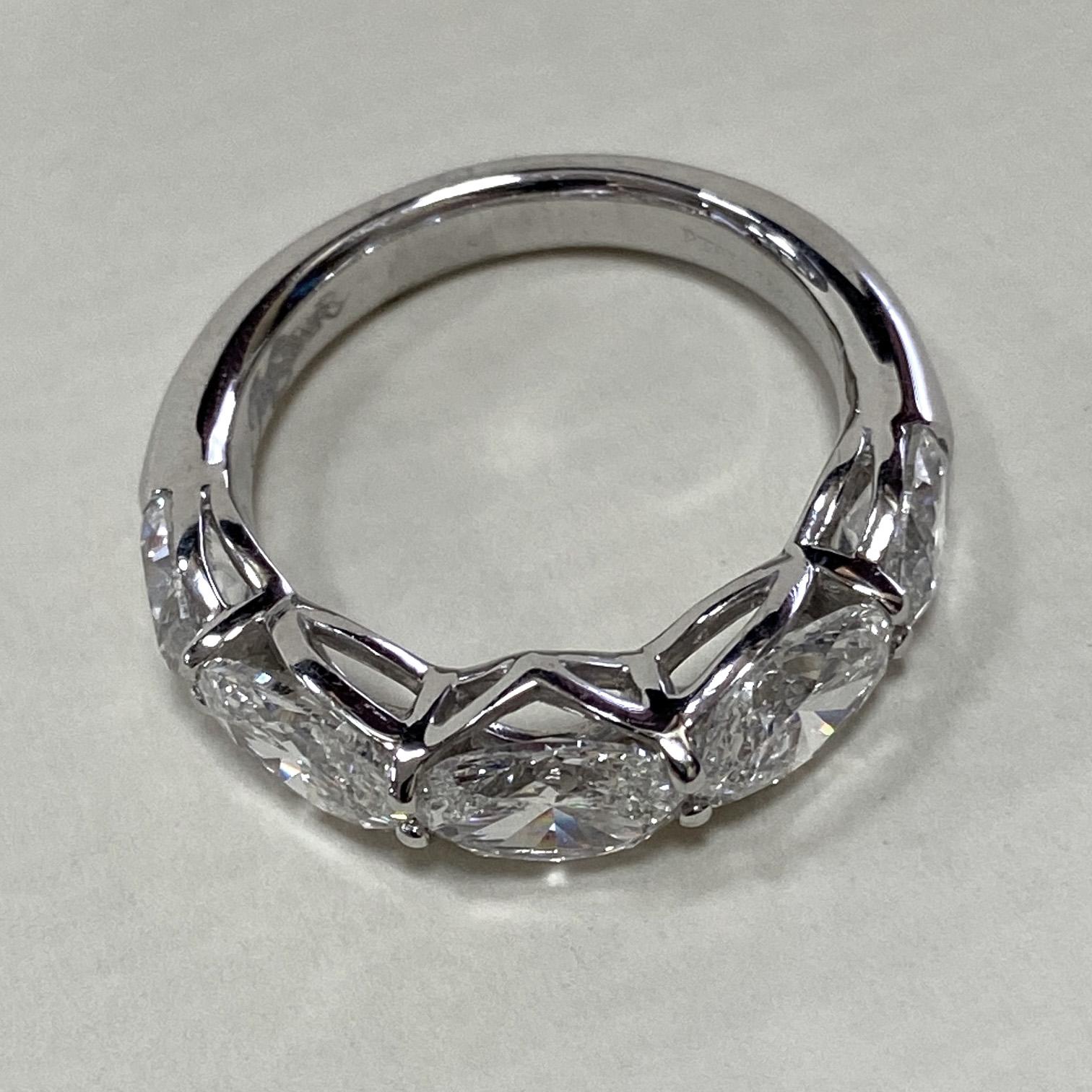 From designer JB Star, this platinum band features a shared prong side-by-side five station oval diamond composition.  The five stations are set with a total of 3.15 carats of G color, VS clarity oval diamonds.