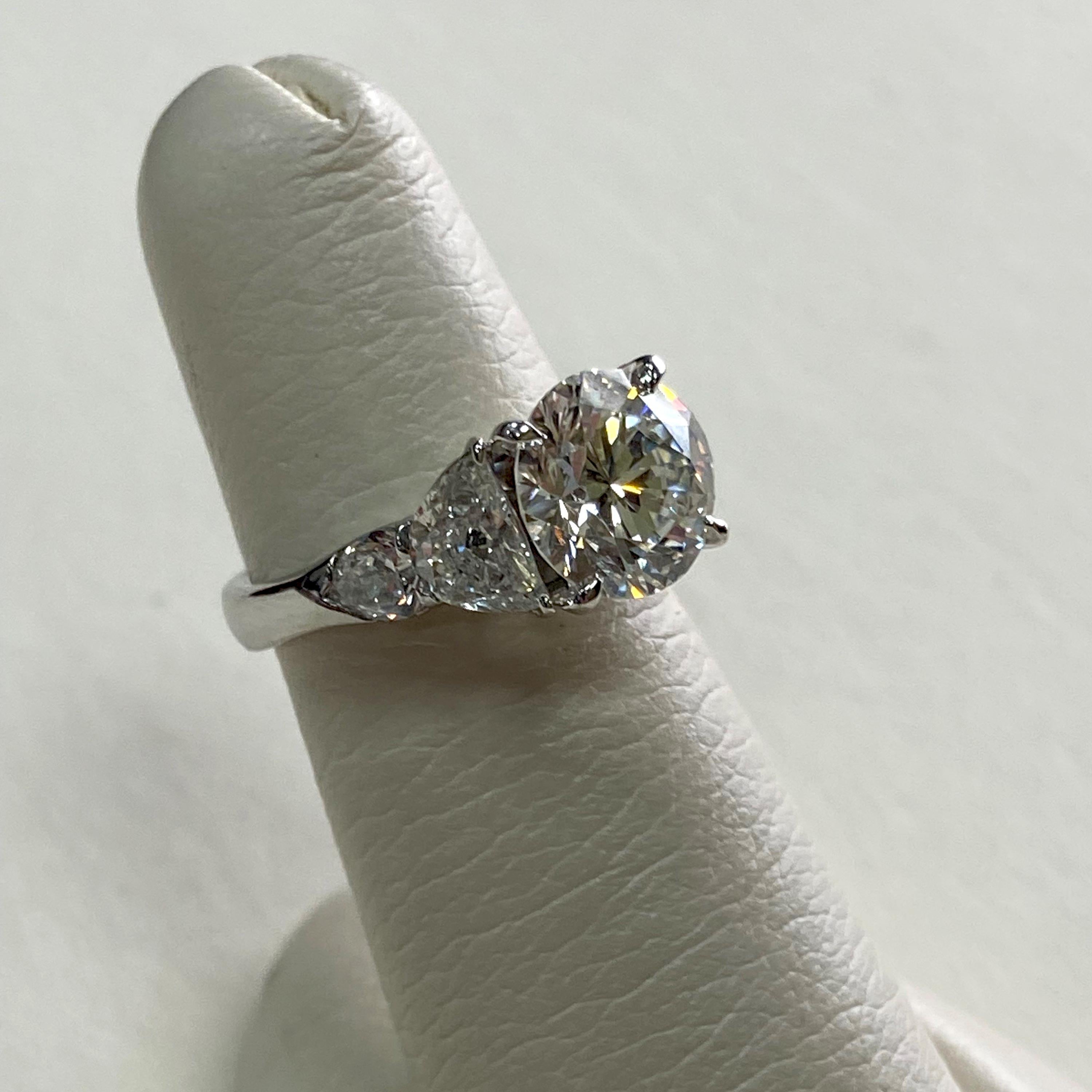 Contemporary JB Star Platinum Diamond Engagement Ring with Half Moon and Pear Shaped Dia Trim For Sale