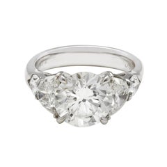 JB Star Platinum Diamond Engagement Ring with Half Moon and Pear Shaped Dia Trim