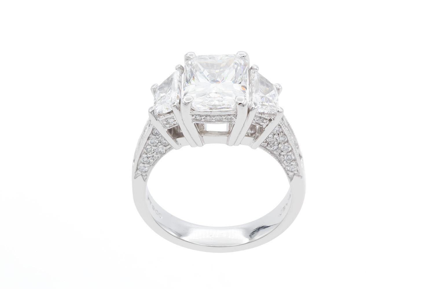 Contemporary JB Star Platinum & GIA Certified Radiant Cut Diamond Three Stone Engagement Ring For Sale